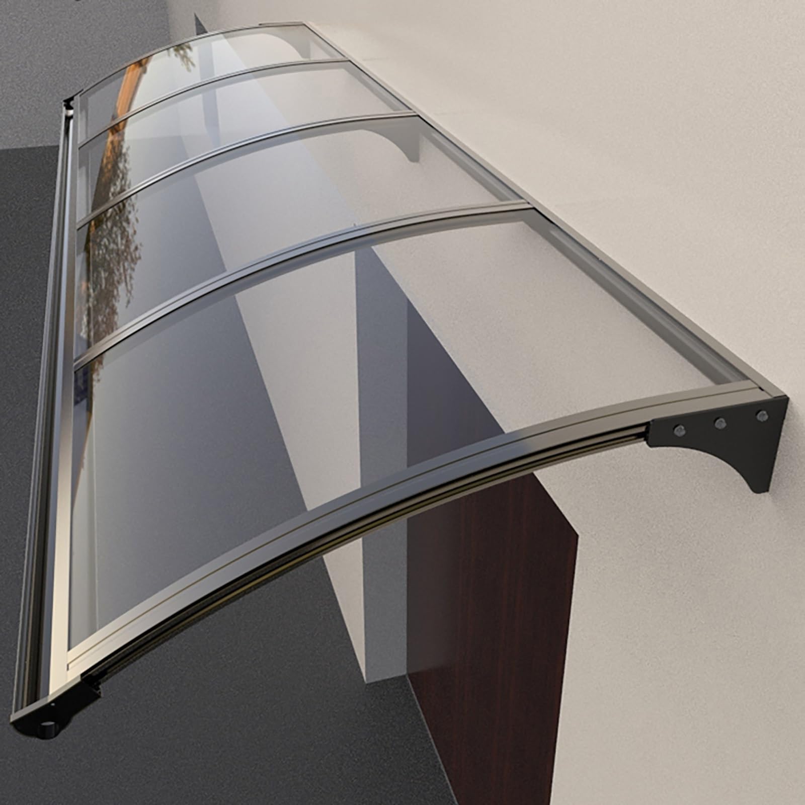 Auvent extérieur polycarbonate fini la pluie sur la fenêtre du porche