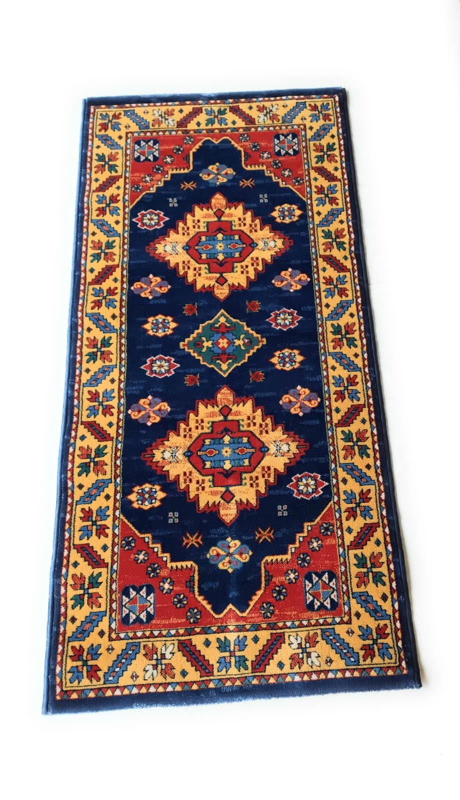 Alfombra geométrica azul Costa de lana para transformar su salón en un oasis de confort