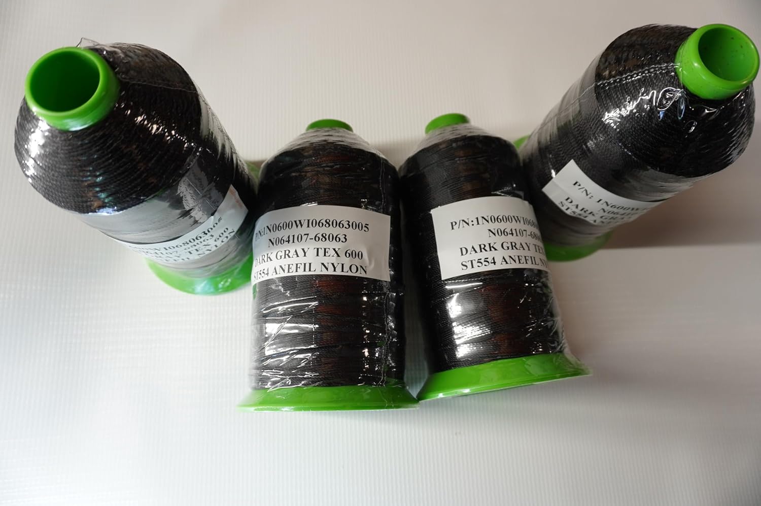 Nylon. ANEFIL Nylon Filament Thread ST554 Dark Gray TEX 600 N064107-68063 Specification A-A-59826A TY 1 CL 8 ST554N3
