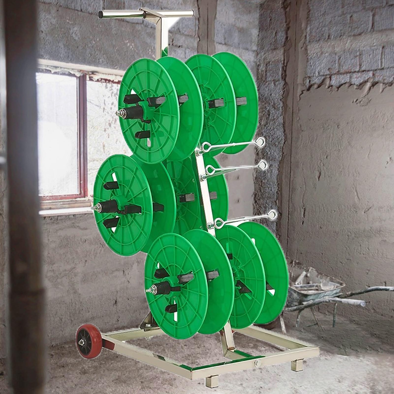 Carro para bobinas verde portacables para mover hilos eléctricos fácilmente en el taller