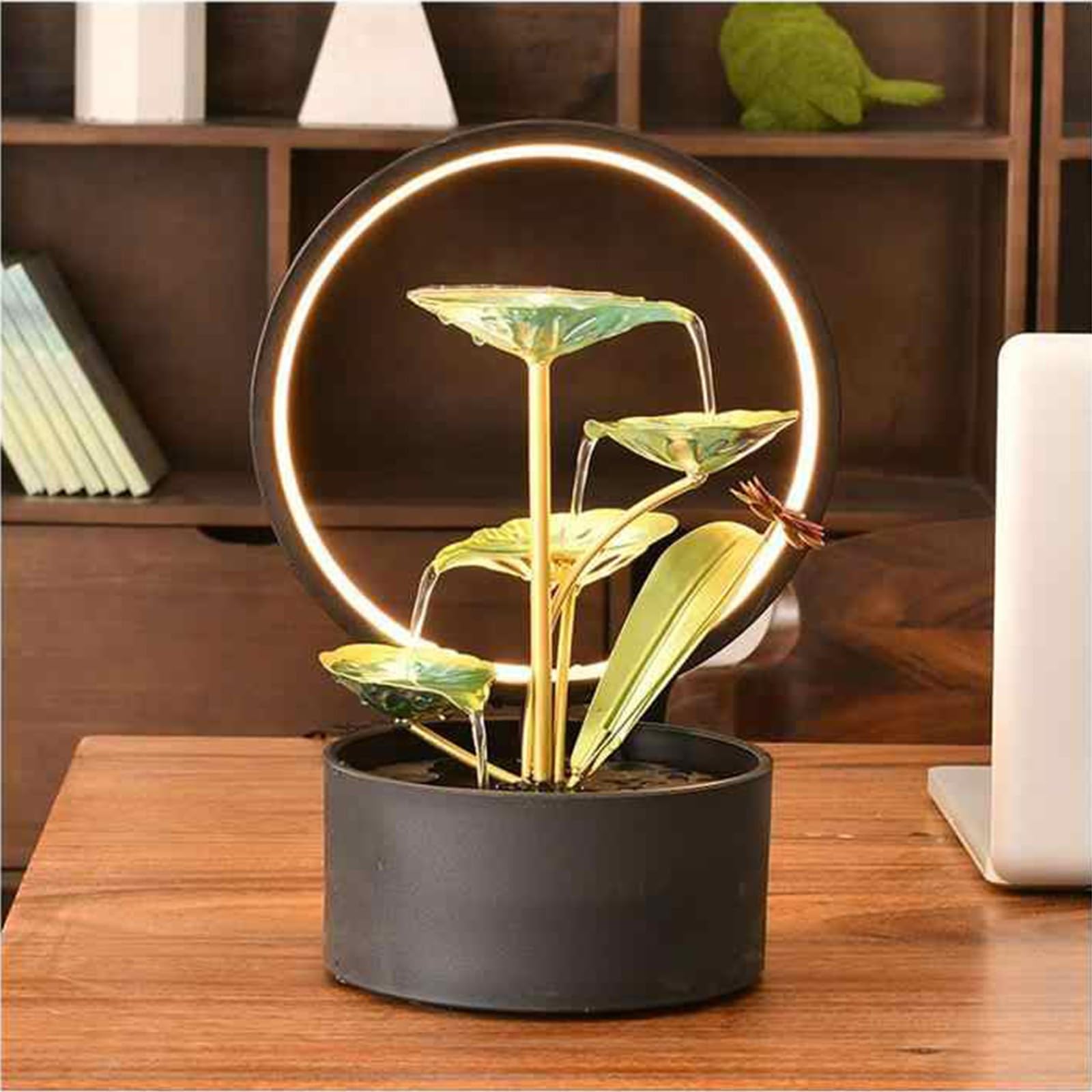 Adorno elegante con fuente de mesa y luz LED para un comedor zen