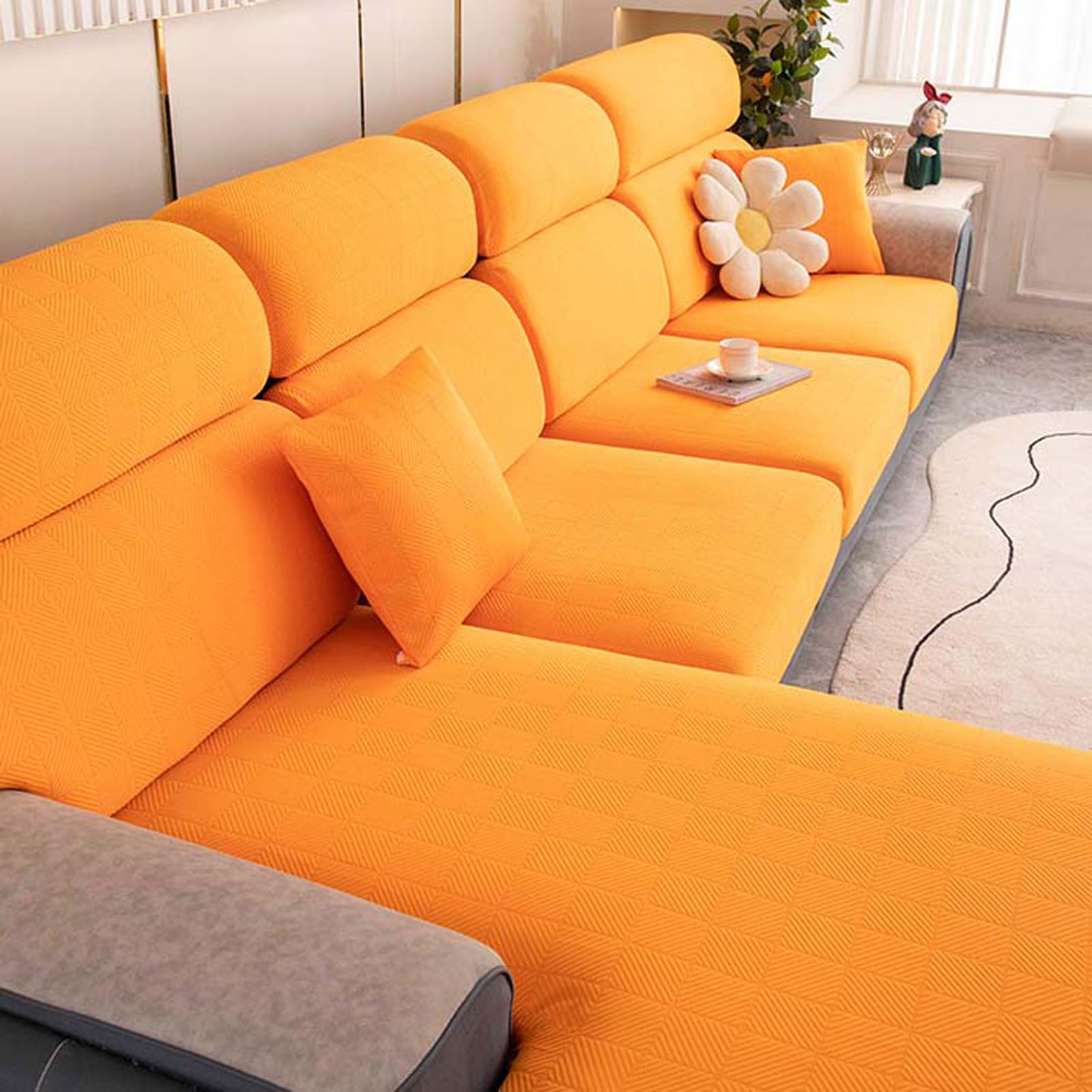 Housse de coussin élastique et revêtement velours pour moderniser un canapé d'angle usé