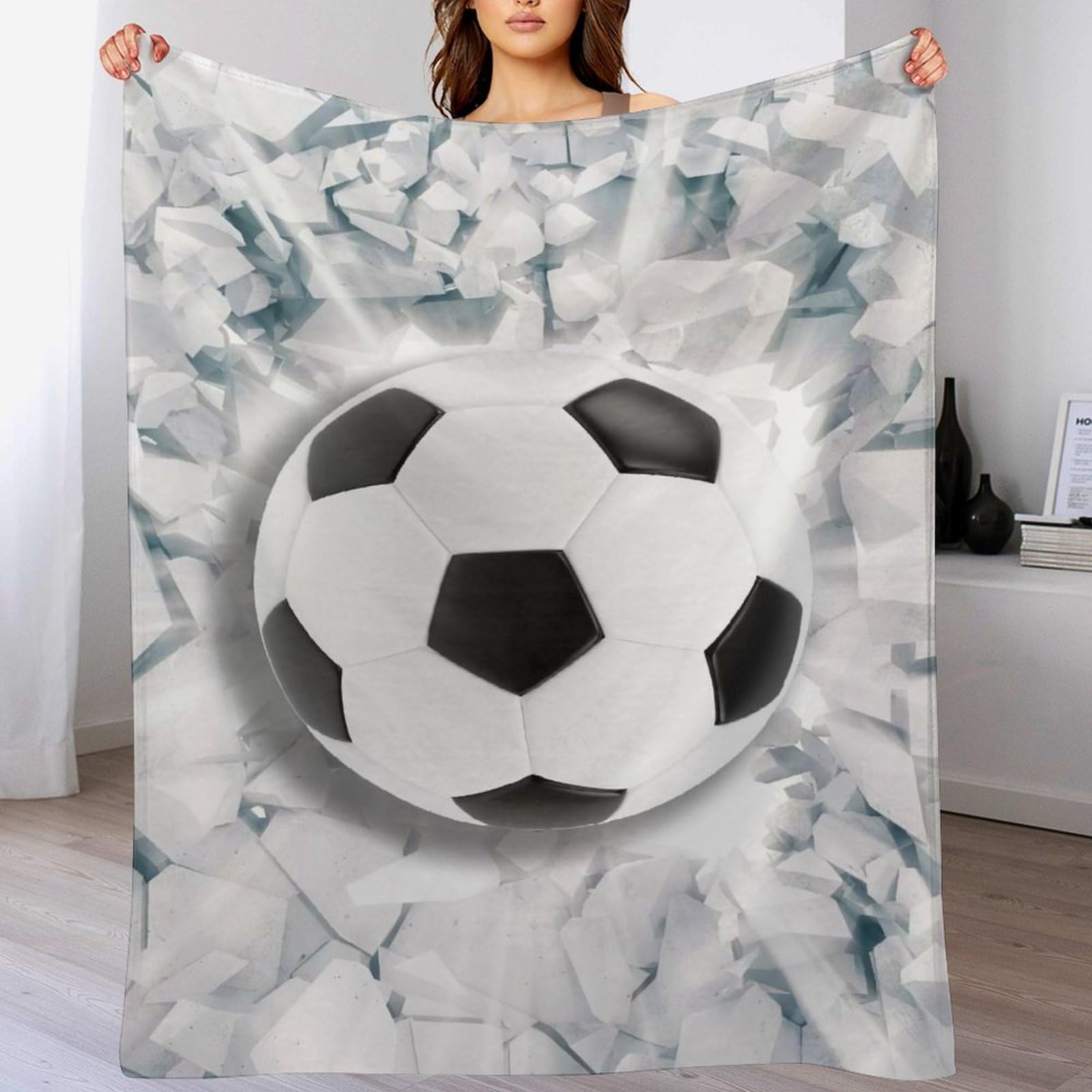 Couverture football en peluche souple pour des soirées cocooning sur le canapé