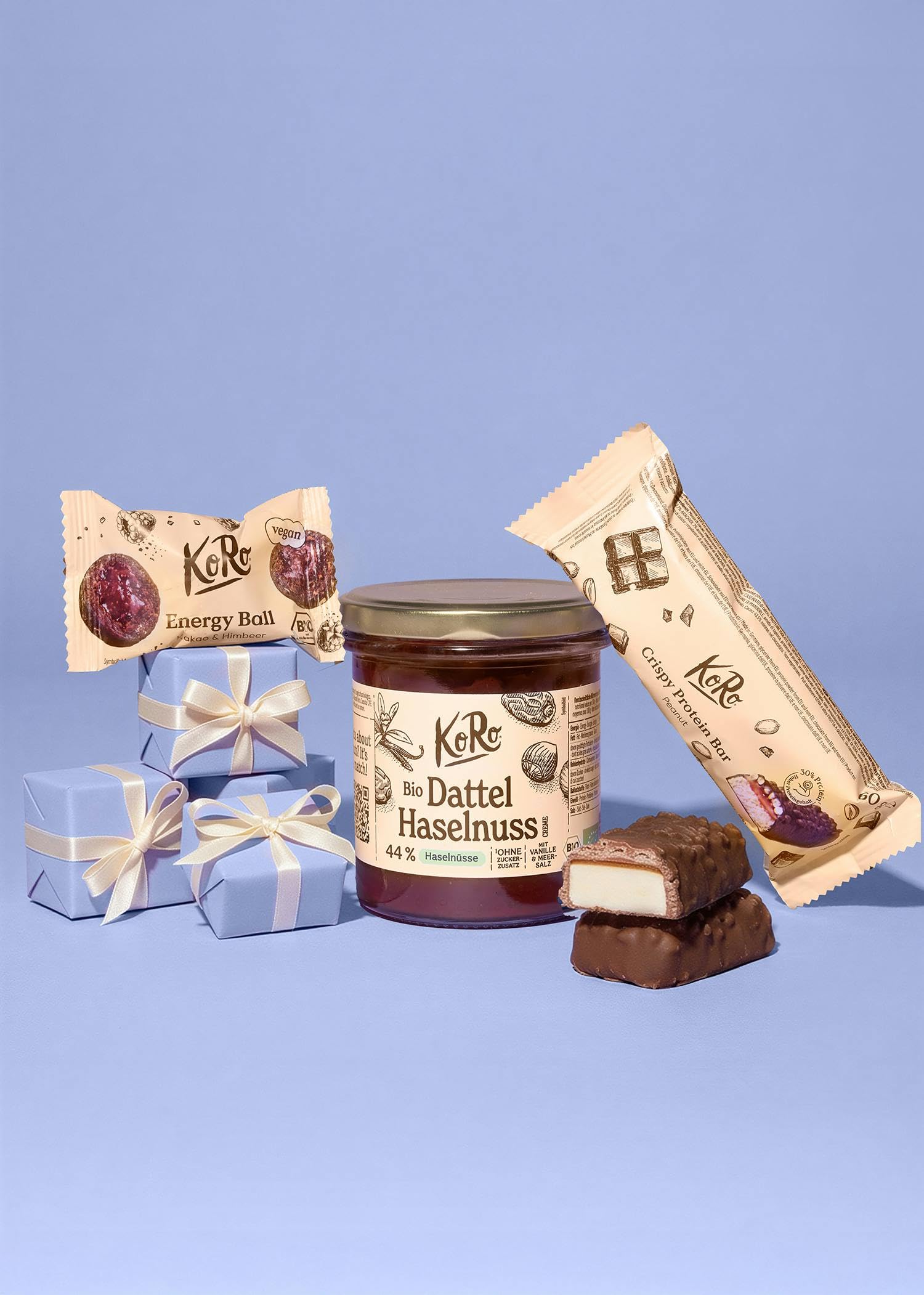 KoRo - KoRo Discovery Geschenkbox - Mit 8 vielseitigen KoRo-Leckereien -  Liebevoll gestaltetes Design - Ideal zum Verschenken oder Durchprobieren