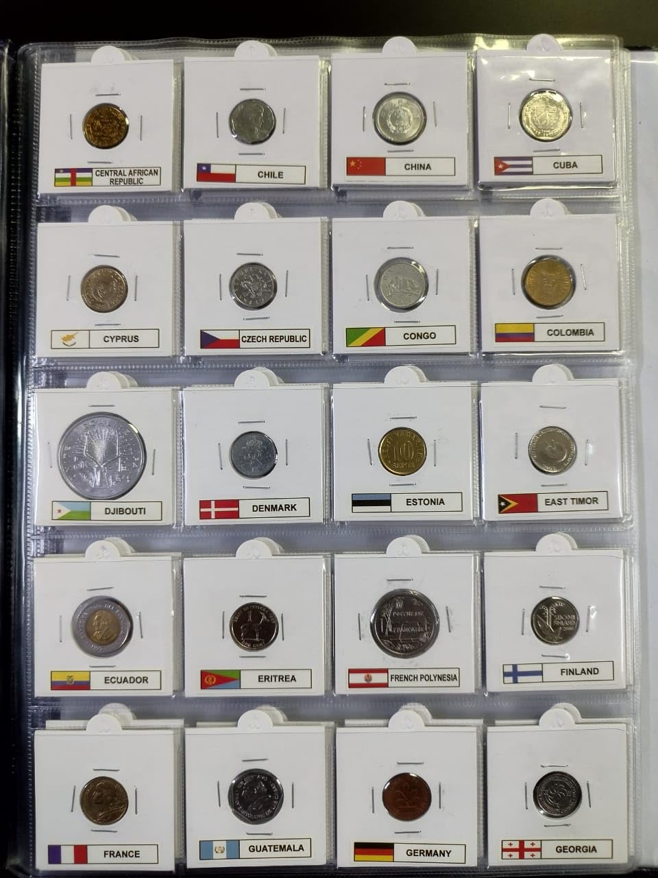 100 different countries coins with album : Collector's Den loaded