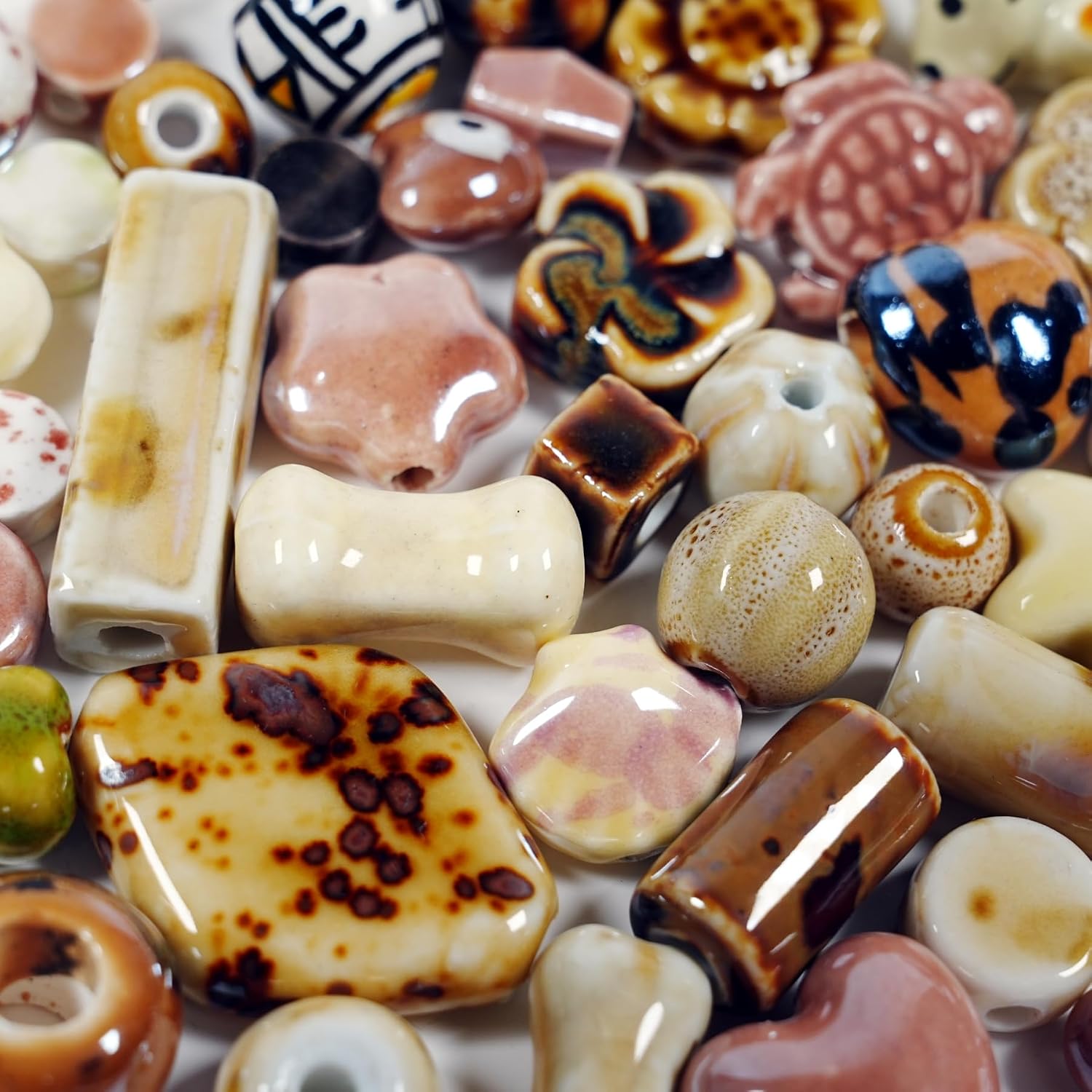 50Pcs Non-Repeated Ceramic Beads, 1 Box Brown Series Porcelain Beads with 1 Roll 10m Bracelet String, Flower Animal Shaped Porcelain Spacer Bead for Jewelry Making DIY Necklace Bracelet (Brown Series)