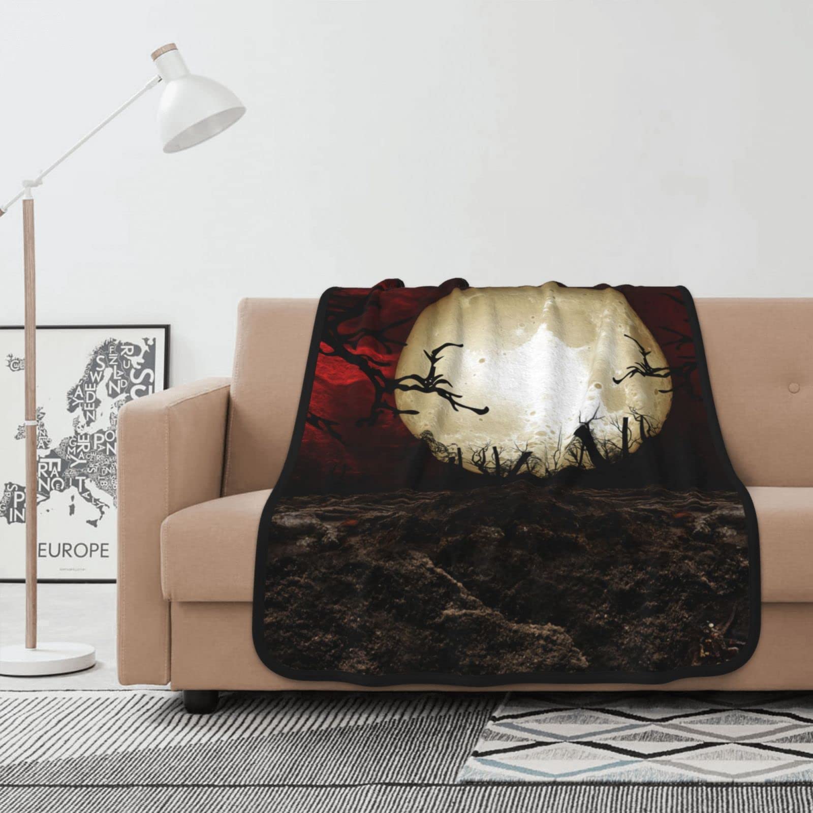 Couverture flanelle ciel écarlate pour soirées cocooning canapé et lit