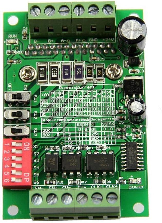 Top view of the TB6560 driver board showing power, motor, and control signal terminals, along with DIP switches for configuration.