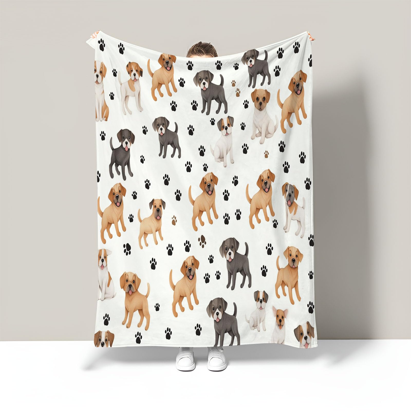 Plaid empreintes de pattes de chiot pour canapé, idéal pour des soirées cocooning au salon