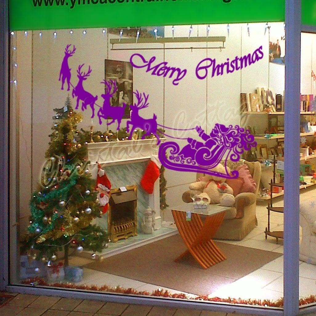 Autocollant Père Noël cerf décoration murale vitre bleu ciel