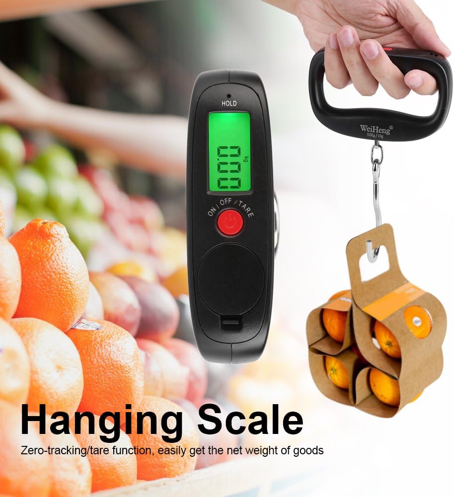 A hand holding the digital hanging scale, weighing a small box of oranges.