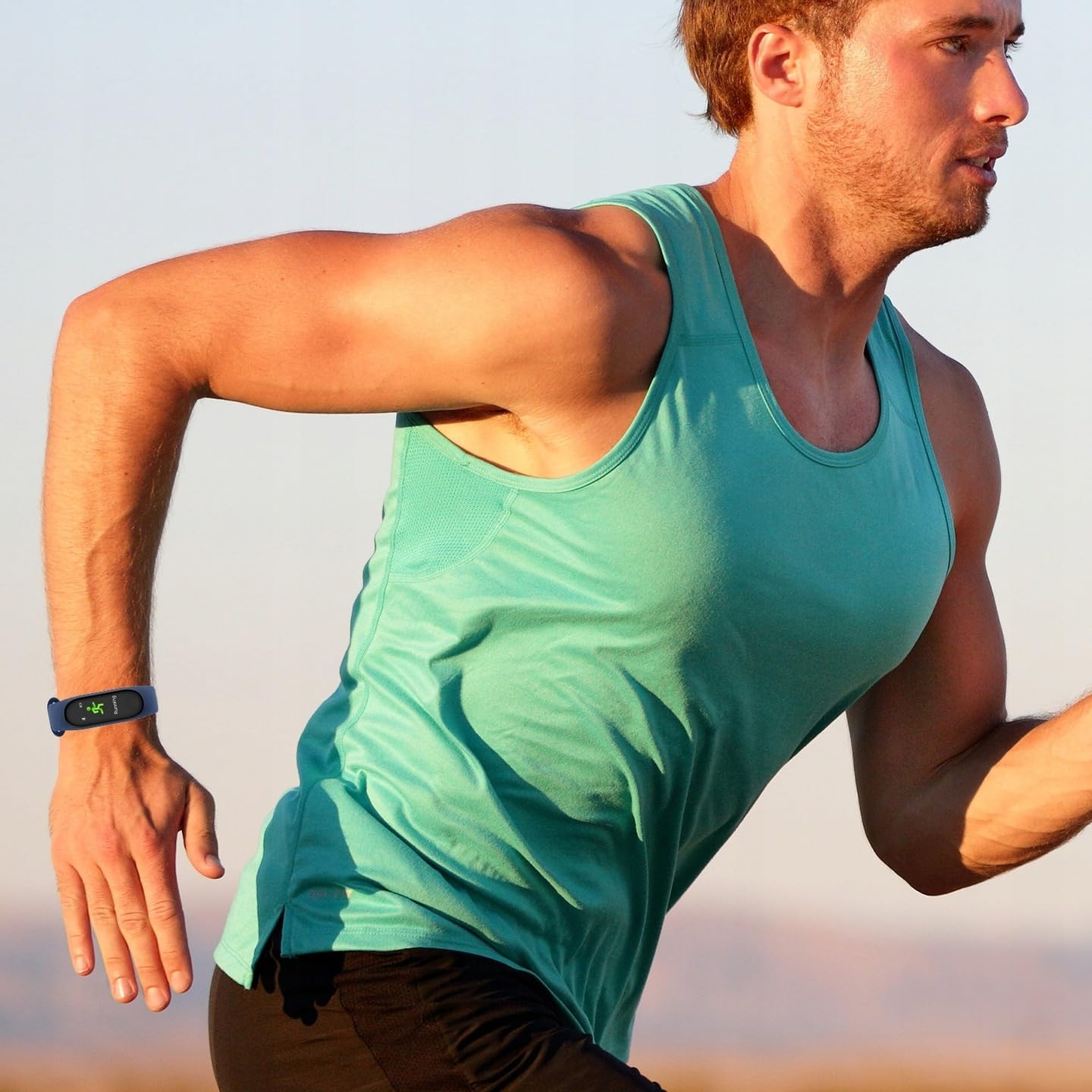 Man running outdoors wearing FOREVER Smartband SB-50