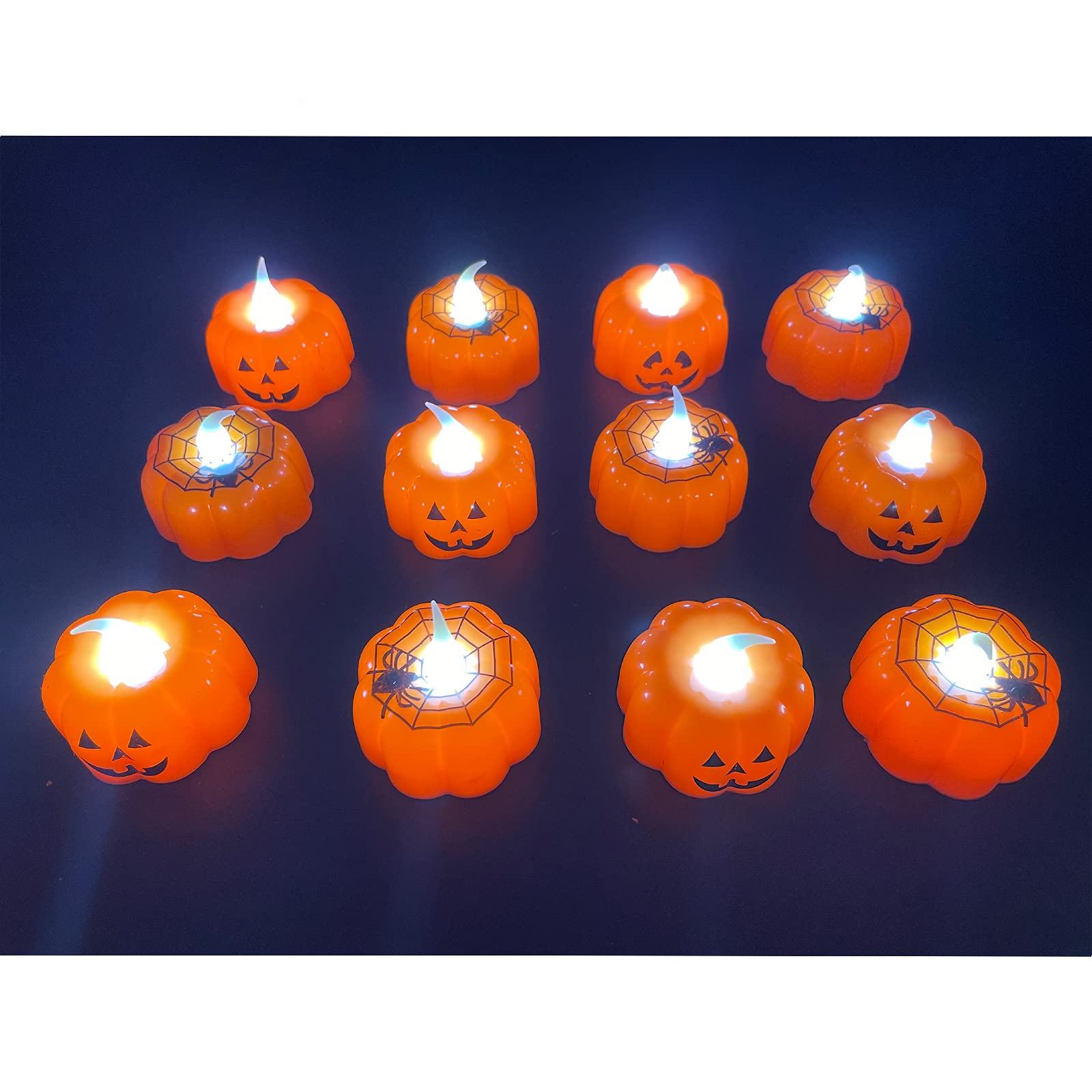 SingTok Lot de 12 bougies chauffe-plat à LED sans flamme vacillante à piles pour décoration d'Halloween en forme de citrouille