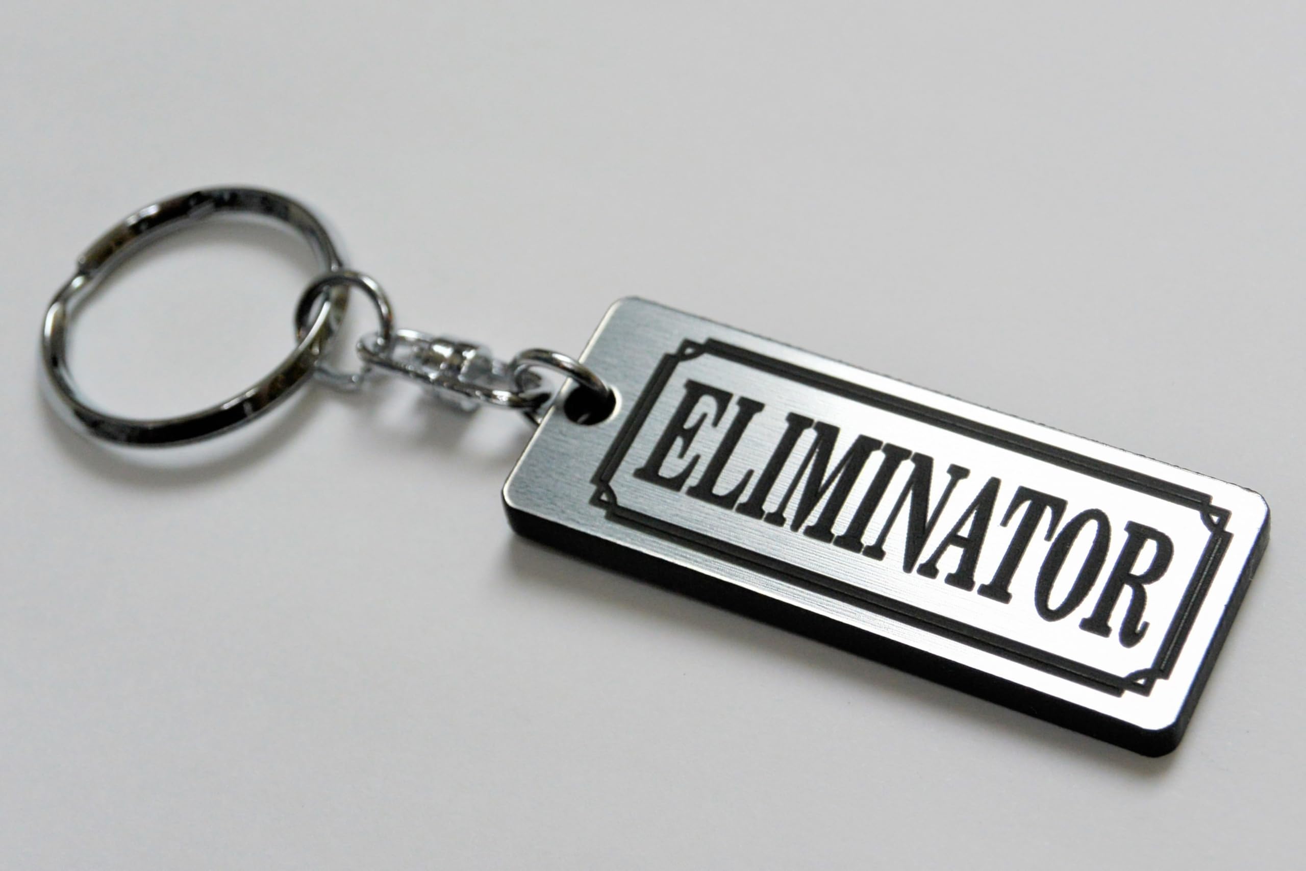 Amazon | QA-43-2 ELIMINATOR キーホルダー 銀黒 2層アクリル製