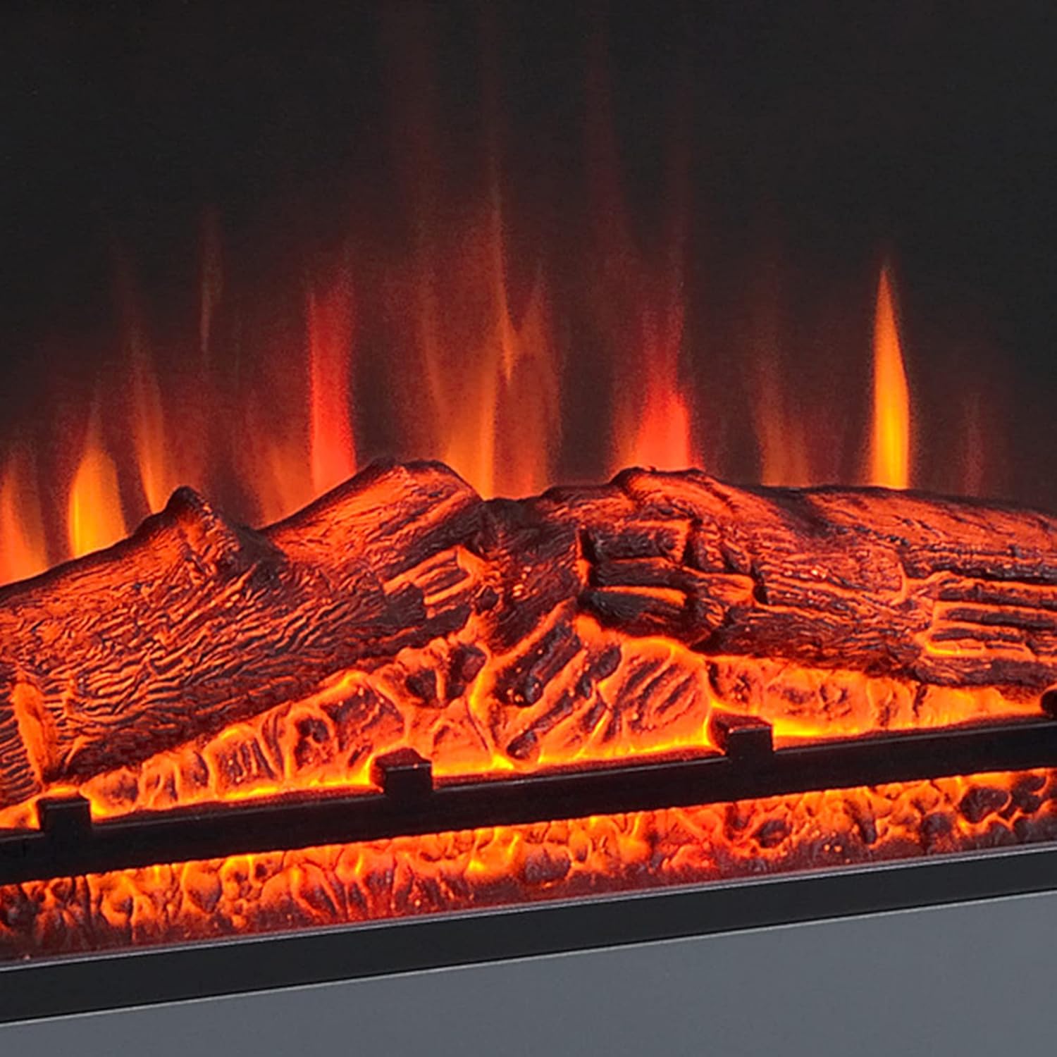 Close-up of the realistic log and flame effect inside the fireplace.