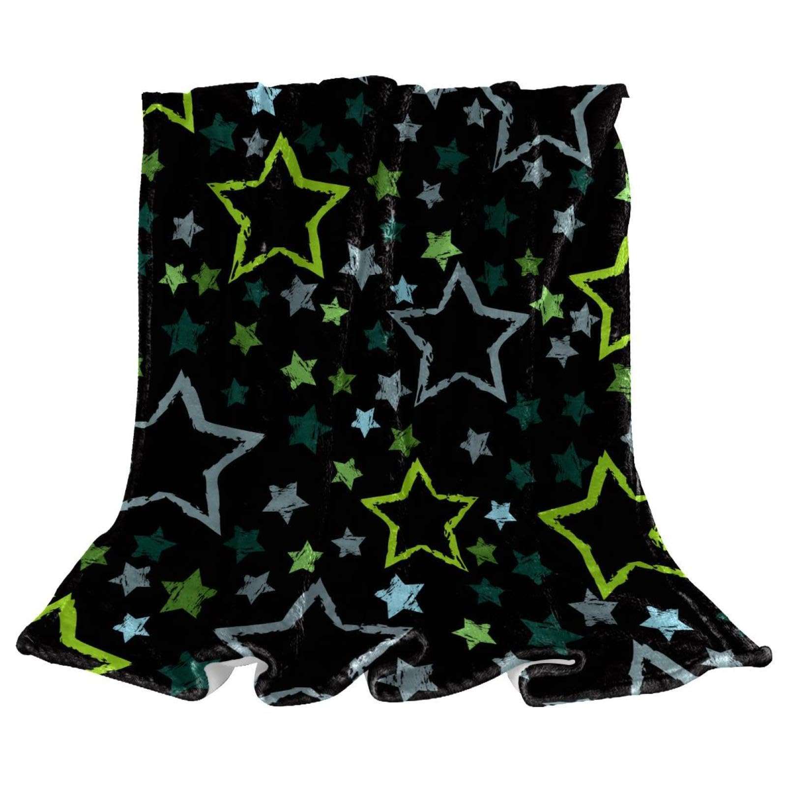 Couverture polaire étoiles noires pour vos soirées cocooning sur le canapé