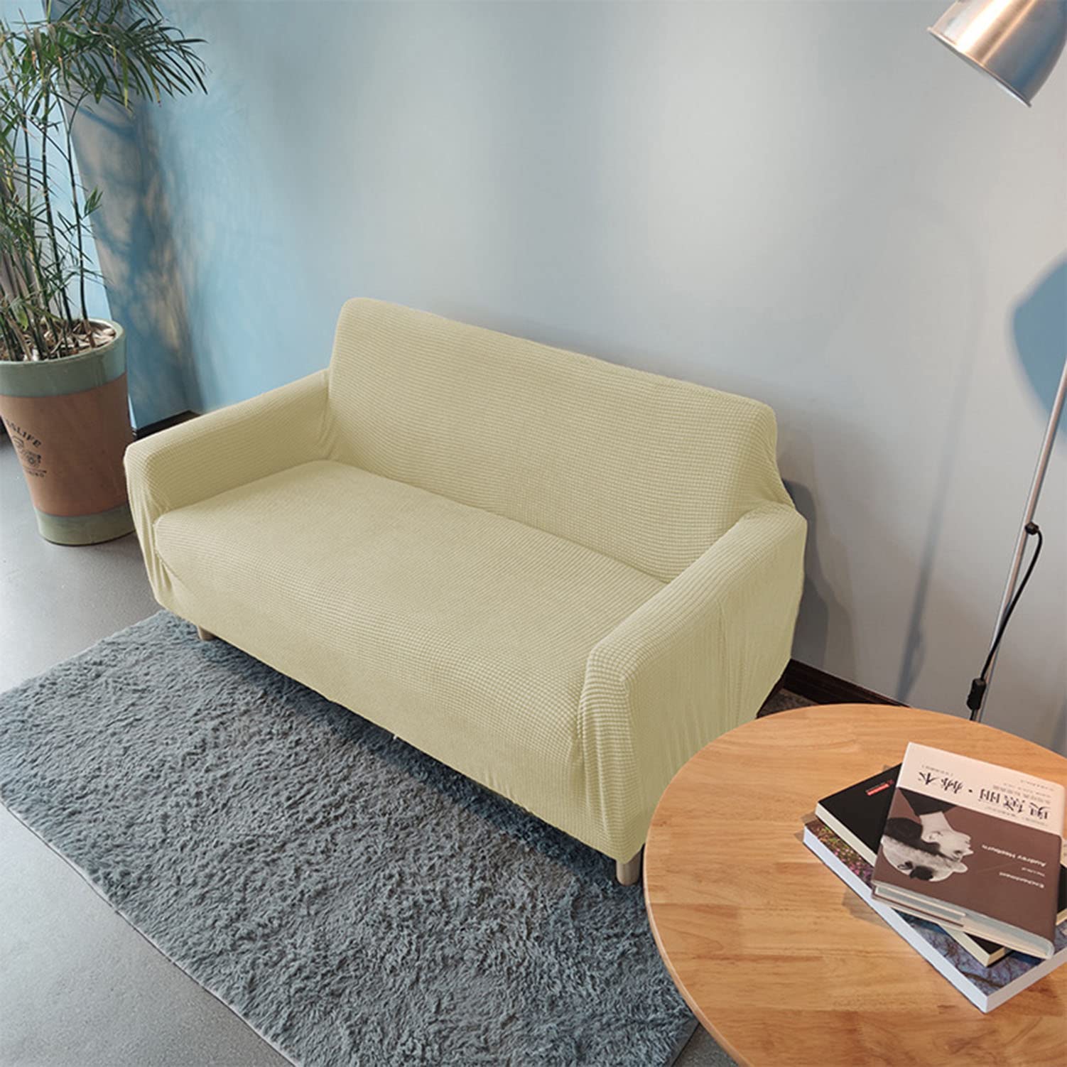 Housse de canapé jacquard extensible pour rénover un meuble usé