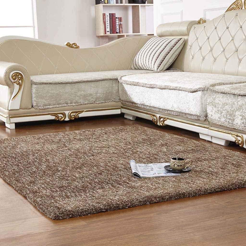 Tapis salon moelleux sous le canapé pour créer un coin lecture cocooning