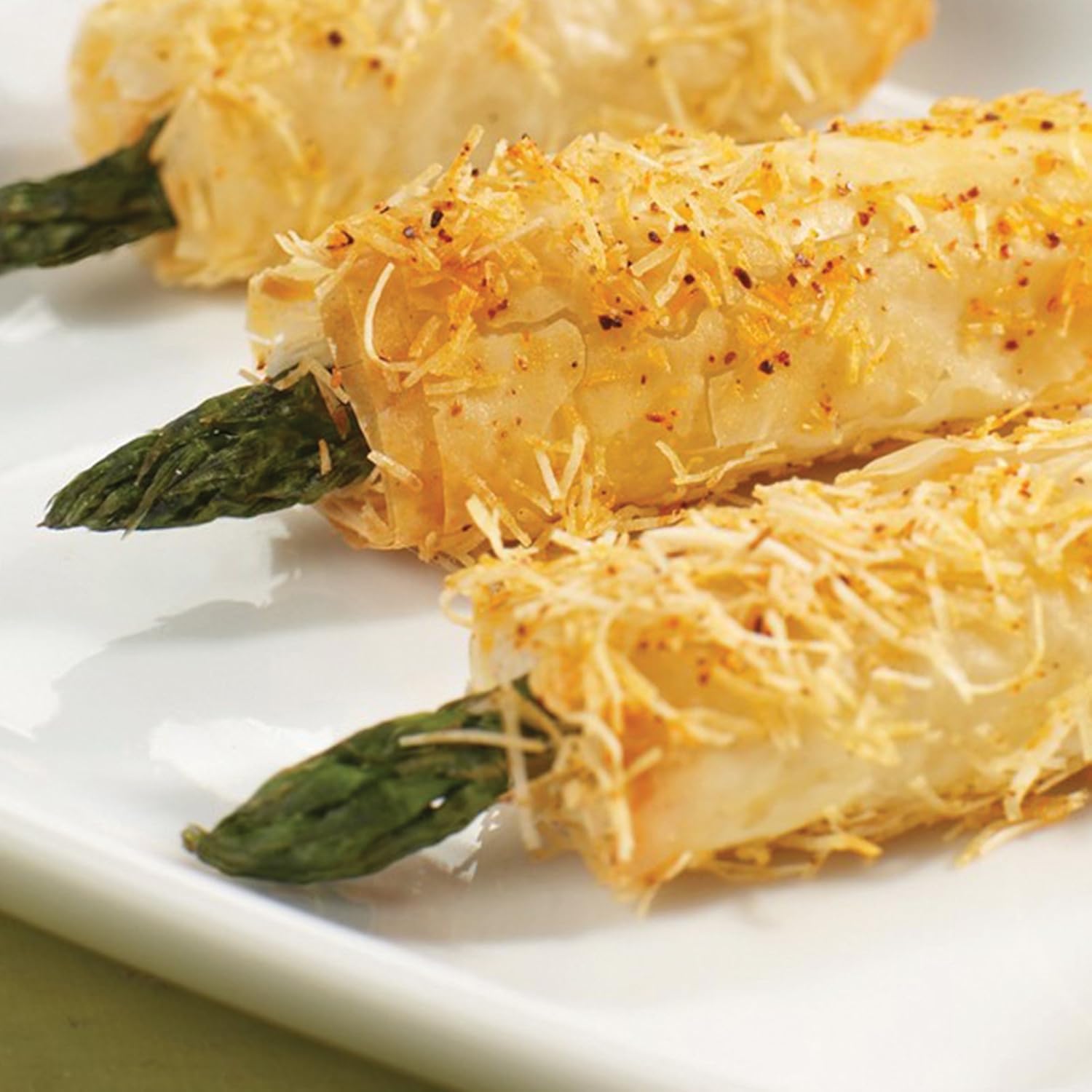 Premium Crispy Asiago Asparagus, 22 pieces, each weighing 0.45 ounces. This appetizer is perfect for your next get-together. Cooking instructions from the Kansas City Steak Company.
