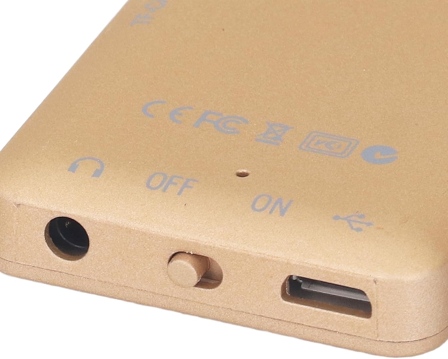 Close-up of the bottom edge of the MP3 MP4 Player, showing the headphone jack, ON/OFF switch, and USB port.