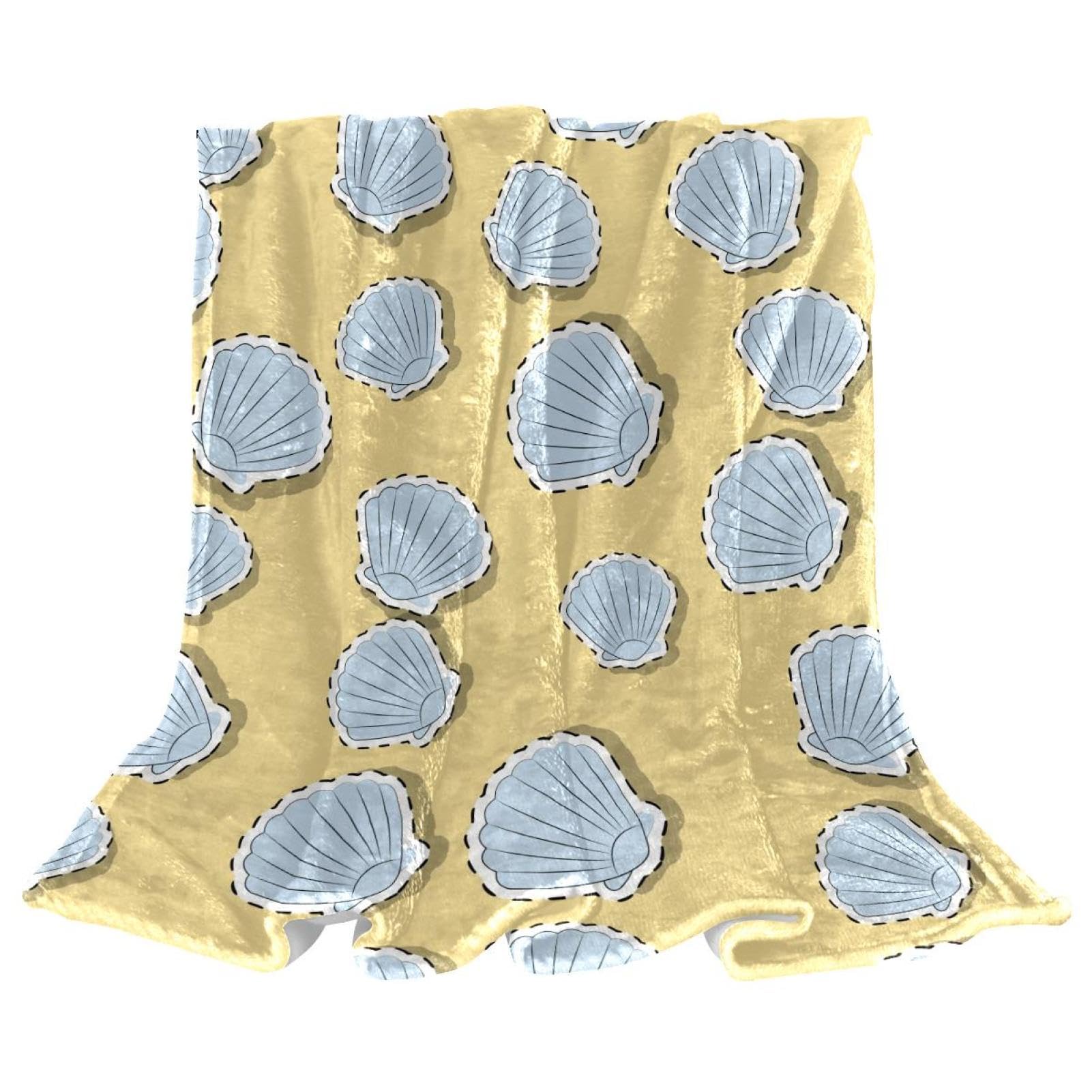 Couverture plaid jaune coquillage pour vos soirées cocooning sur le canapé