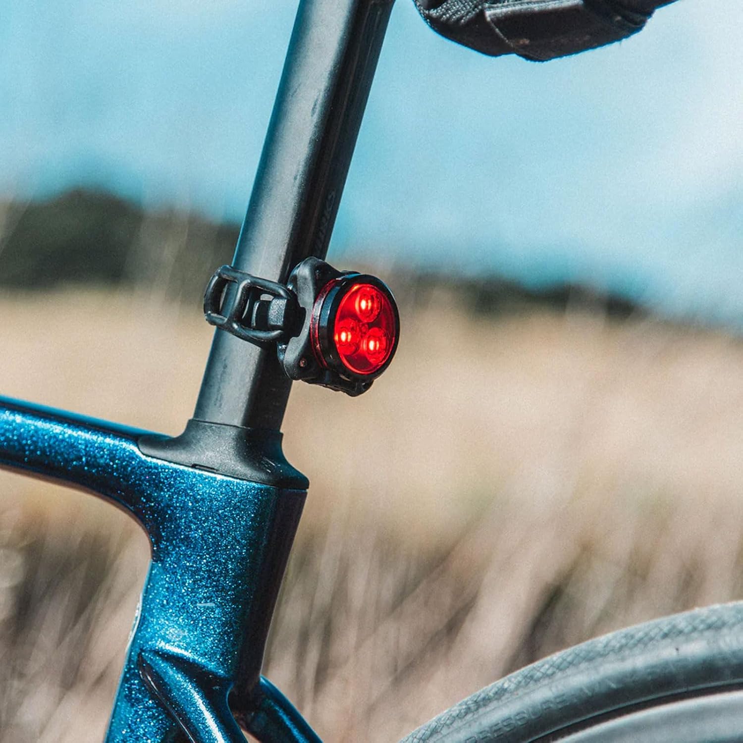 Close-up of the Lezyne Zecto Drive light mounted on a bicycle seatpost.