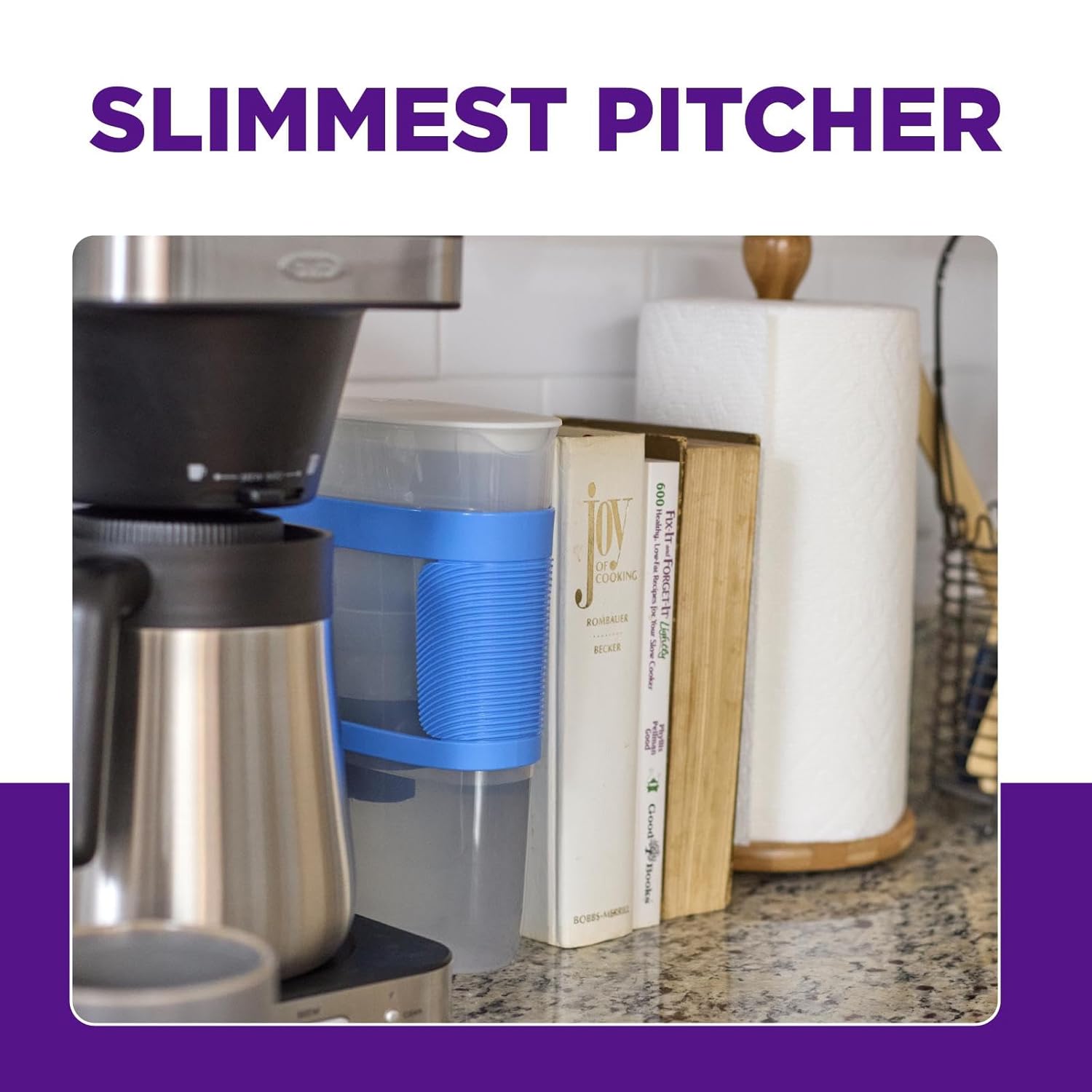 PUR Slim Water Filter Pitcher on a kitchen counter next to a coffee maker and books, showing its slim profile.