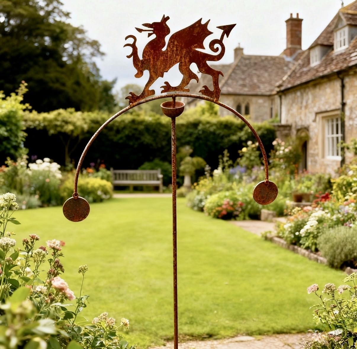 GAP GARDEN PRODUCTS - Welsh dragon Double Ball Wind Rocker/Spinner supplied bare metal that can be painted or left to age over time to give a rustic patina finish…