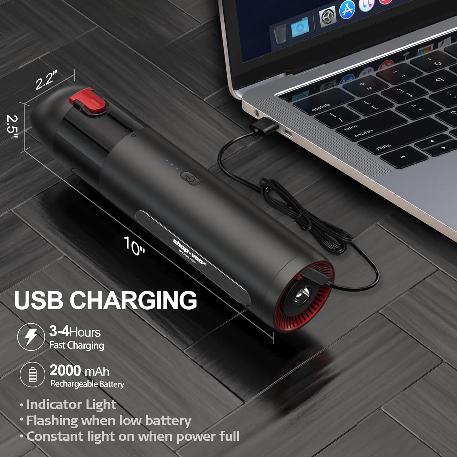 Shop-Vac Cordless Handheld Vacuum connected to a laptop via USB for charging, showing indicator lights and dimensions.