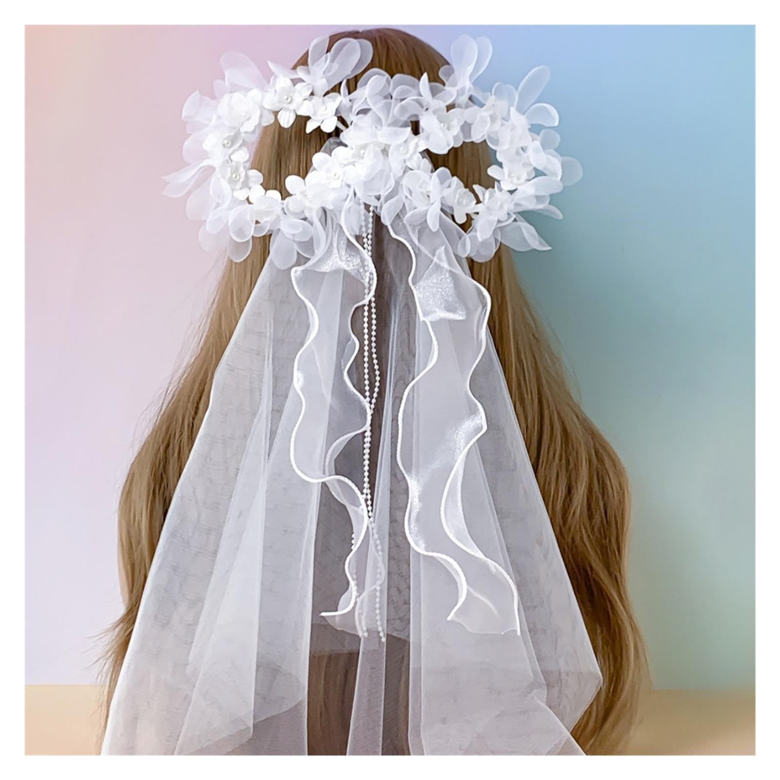 Velo da sposa bianco fata il giorno delle nozze con farfalla