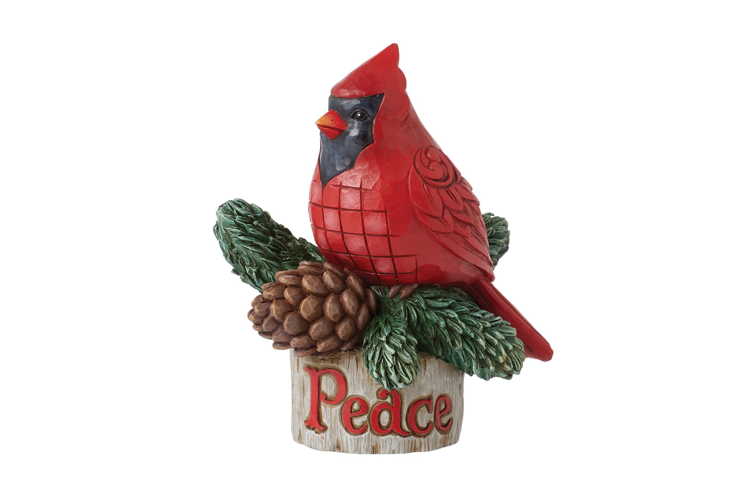 Figurine cardinal Enesco Jim Shore posée sur un meuble pour un salon cosy