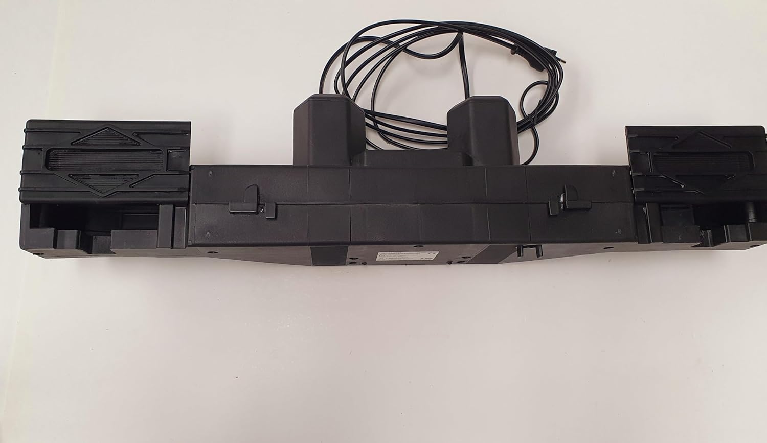 Top view of the OKIN electric bed motor, showing its compact design.