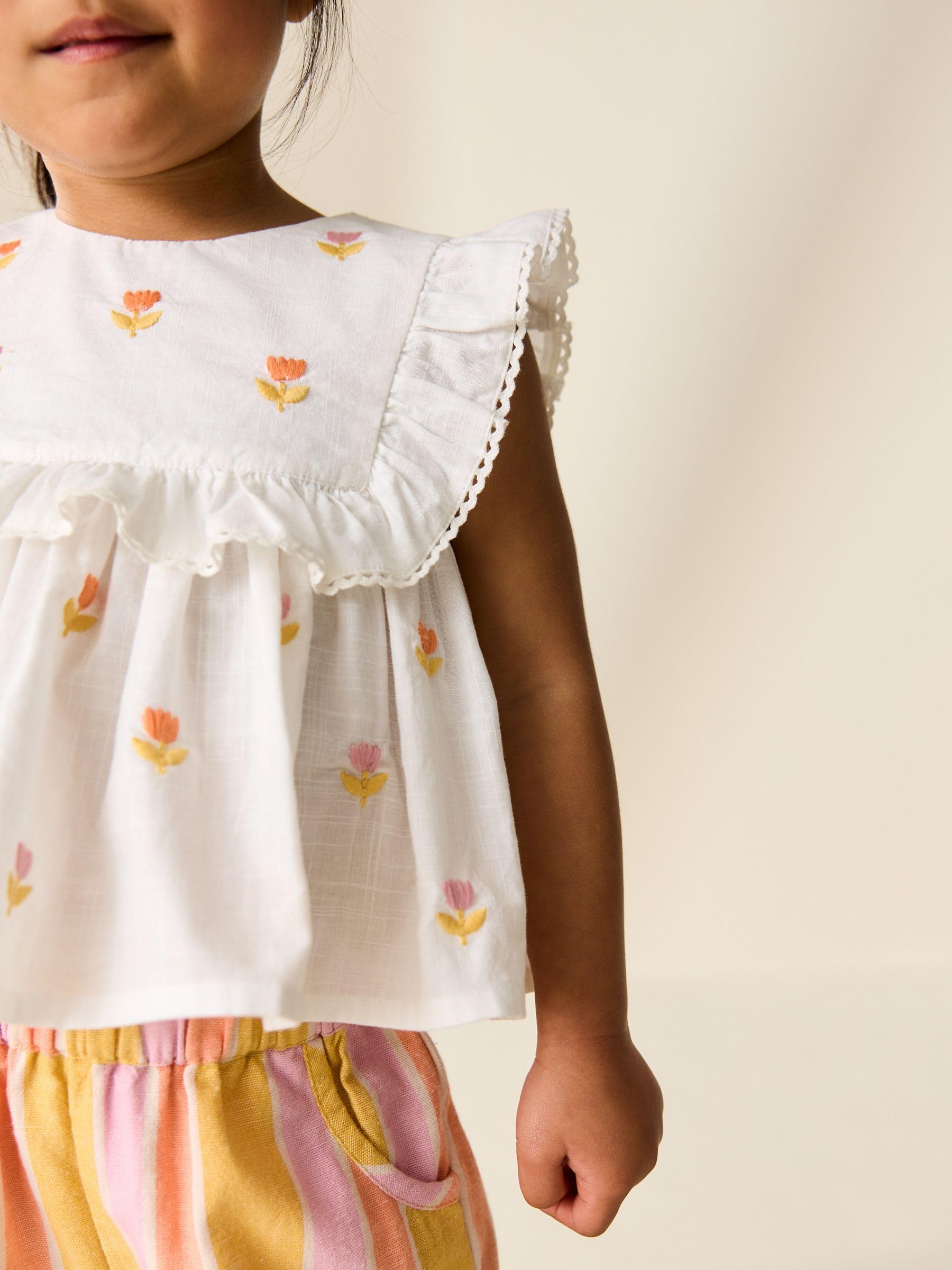 NEXT Niñas Conjunto de blusa y pantalones