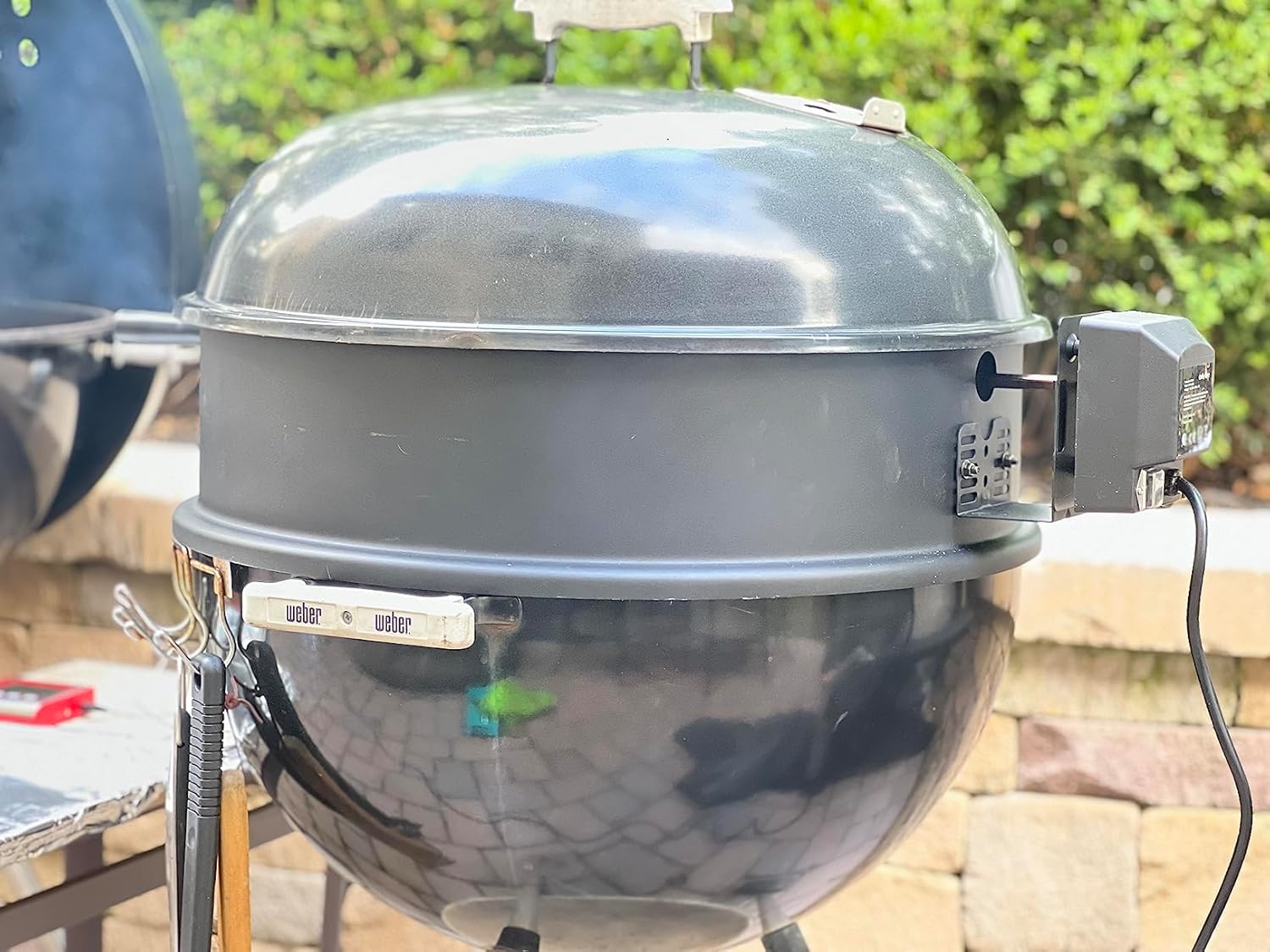 onlyfire Rotisserie Motor mounted on a grill