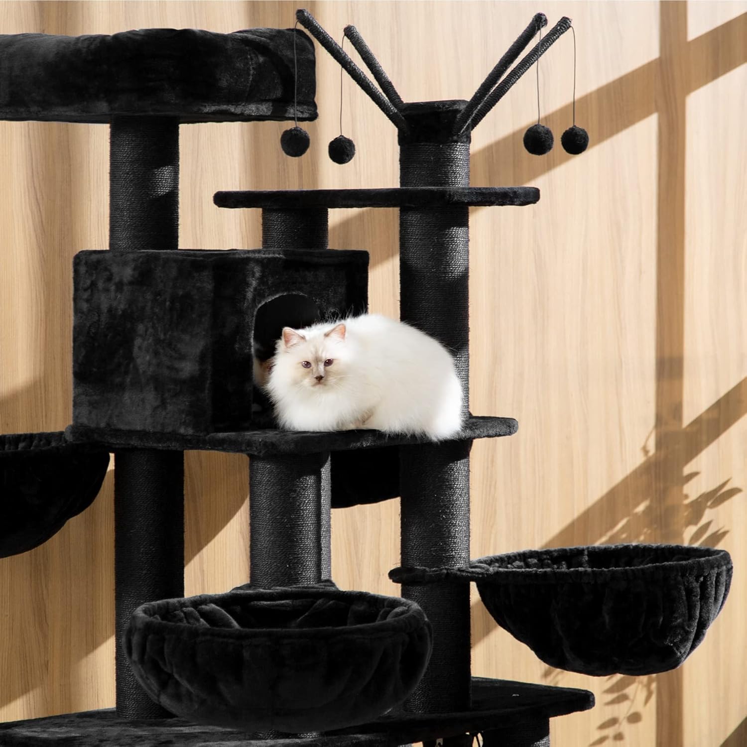 Close-up of a cat on a platform of the TecTake 800740 Cat Tree