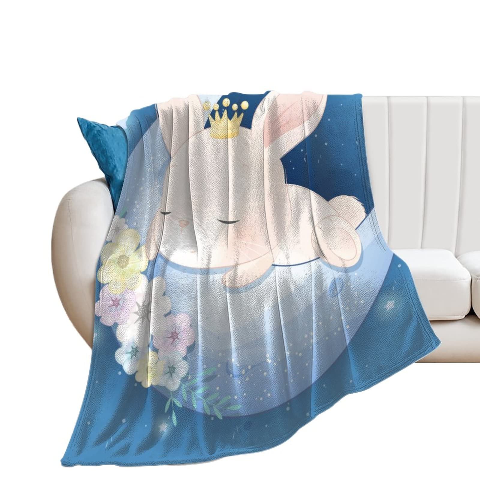 Couverture polaire lapin douce pour des soirées cocooning sur votre canapé