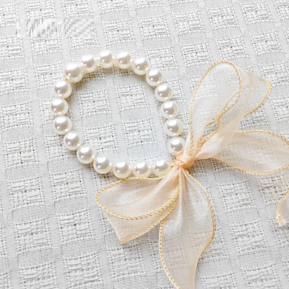 Alzapaños de cortina con perlas OUdini para decorar las ventanas de casa y oficina