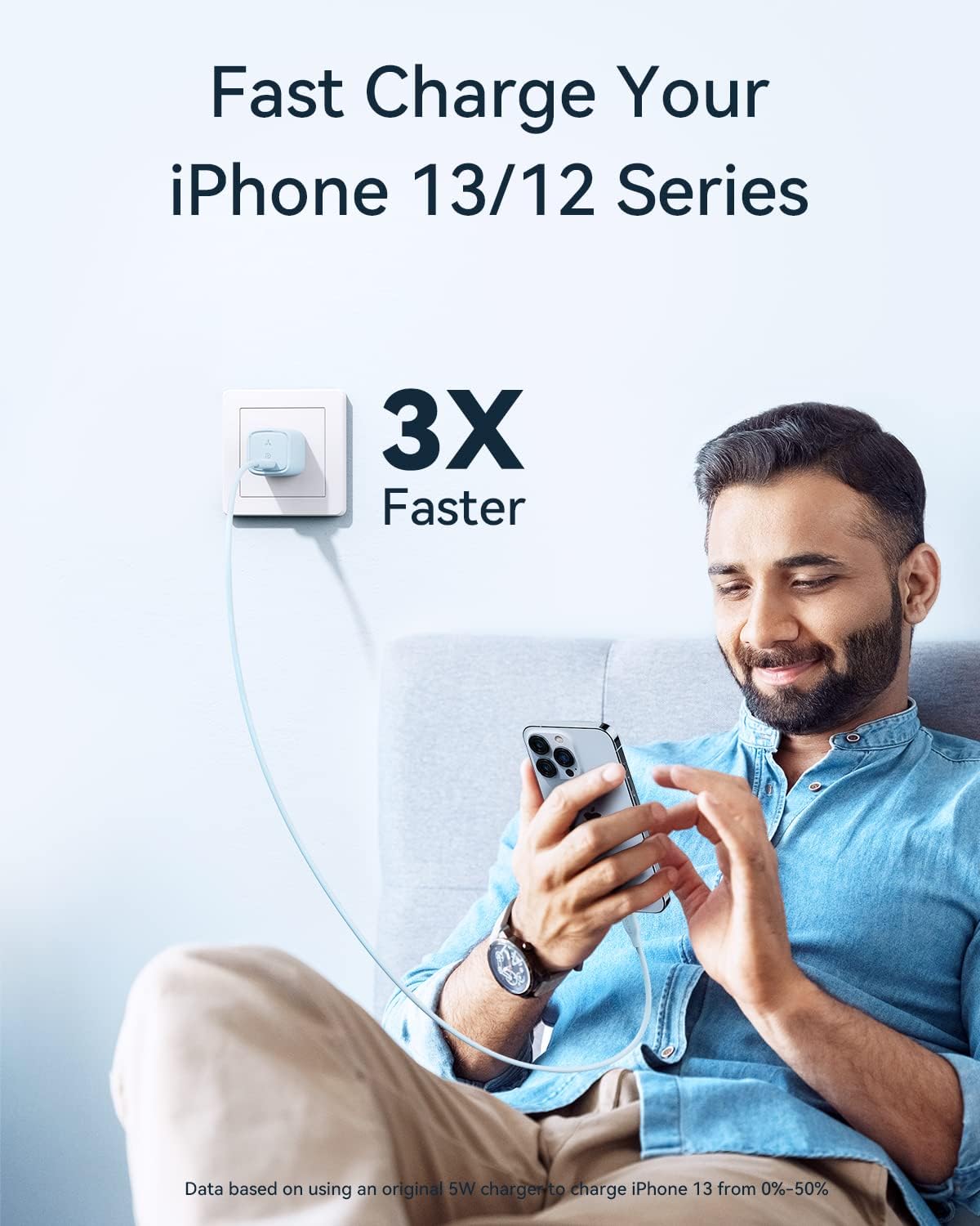 Man plugging a blue VOLTME charger into a wall outlet and connecting it to an iPhone