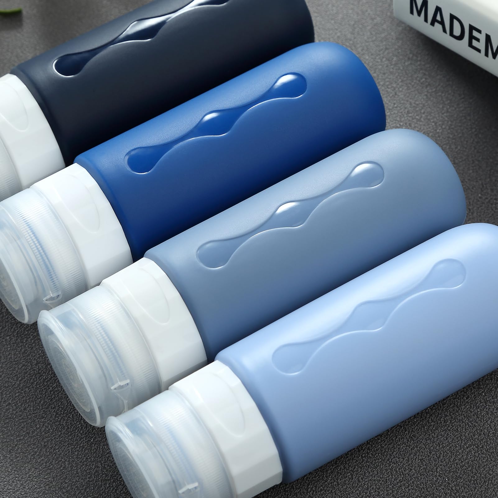 Gemice Bottiglie da Viaggio in Silicone, 4Pezzi 90ml Contenitori con Riutilizzabili Comprimibili, per Shampoo, Balsamo, Crema, Lozione, per Viaggio in Aereo