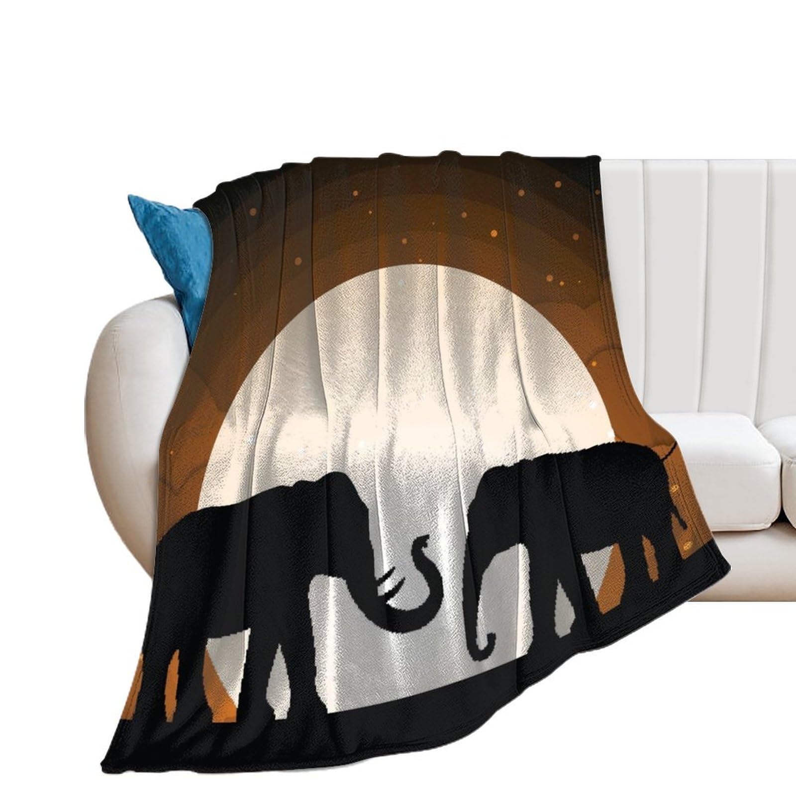 Couverture polaire éléphant contre le froid sur le canapé ou votre lit