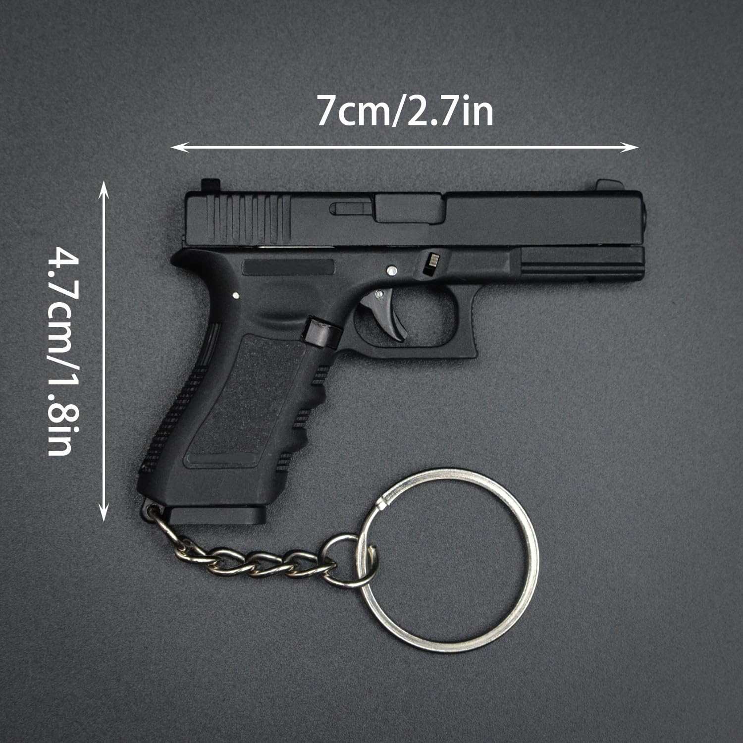 pistool sleutelhanger en meer sieraden en bedels bij