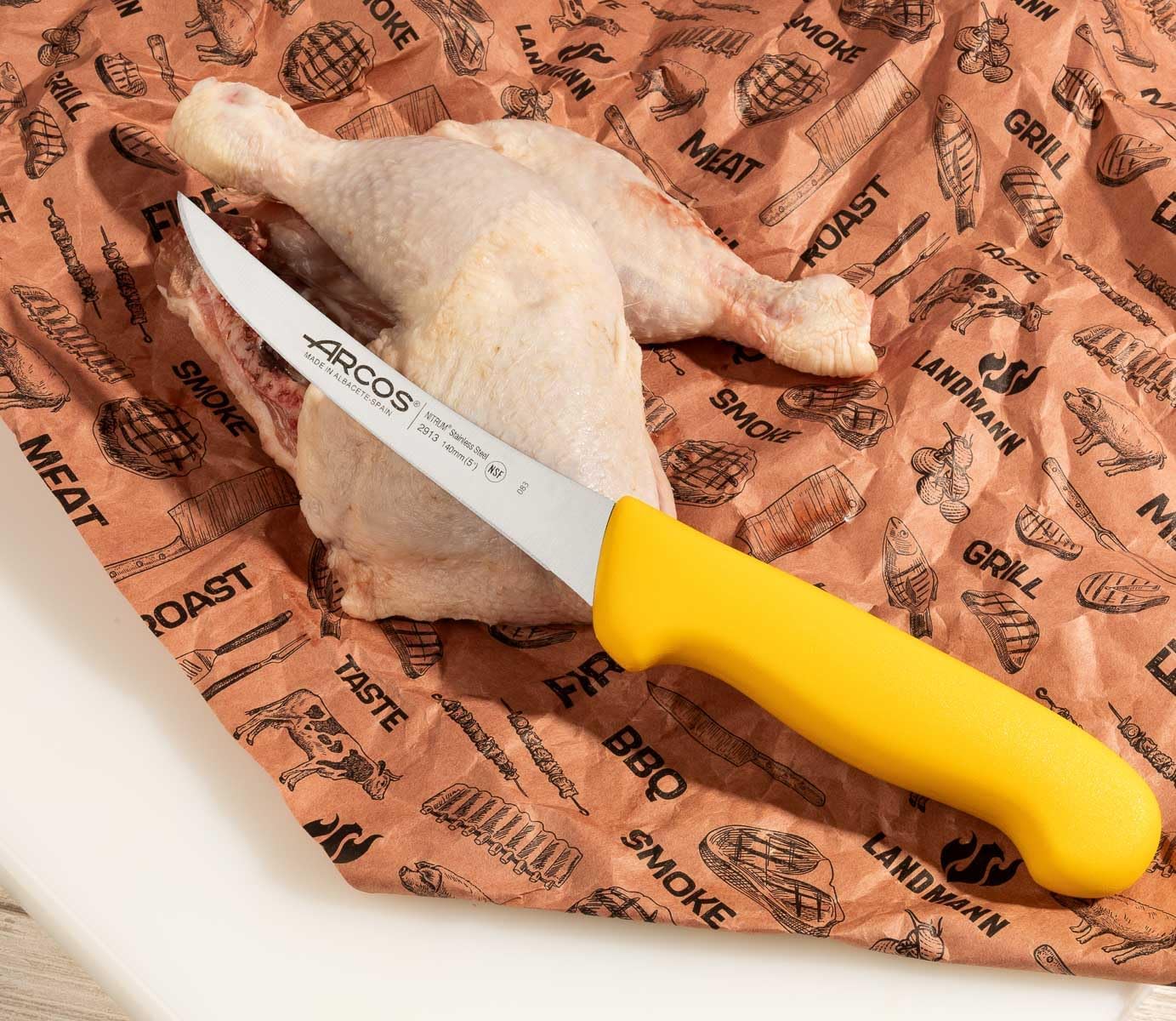 Arcos Boning Knife 5 Inch Nitrum Stainless Steel and 140 mm blade. Professional Butcher Knife to Slice Bones from Meat. Ergonomic Polypropylene Handle. Series 2900. Color Yellow.