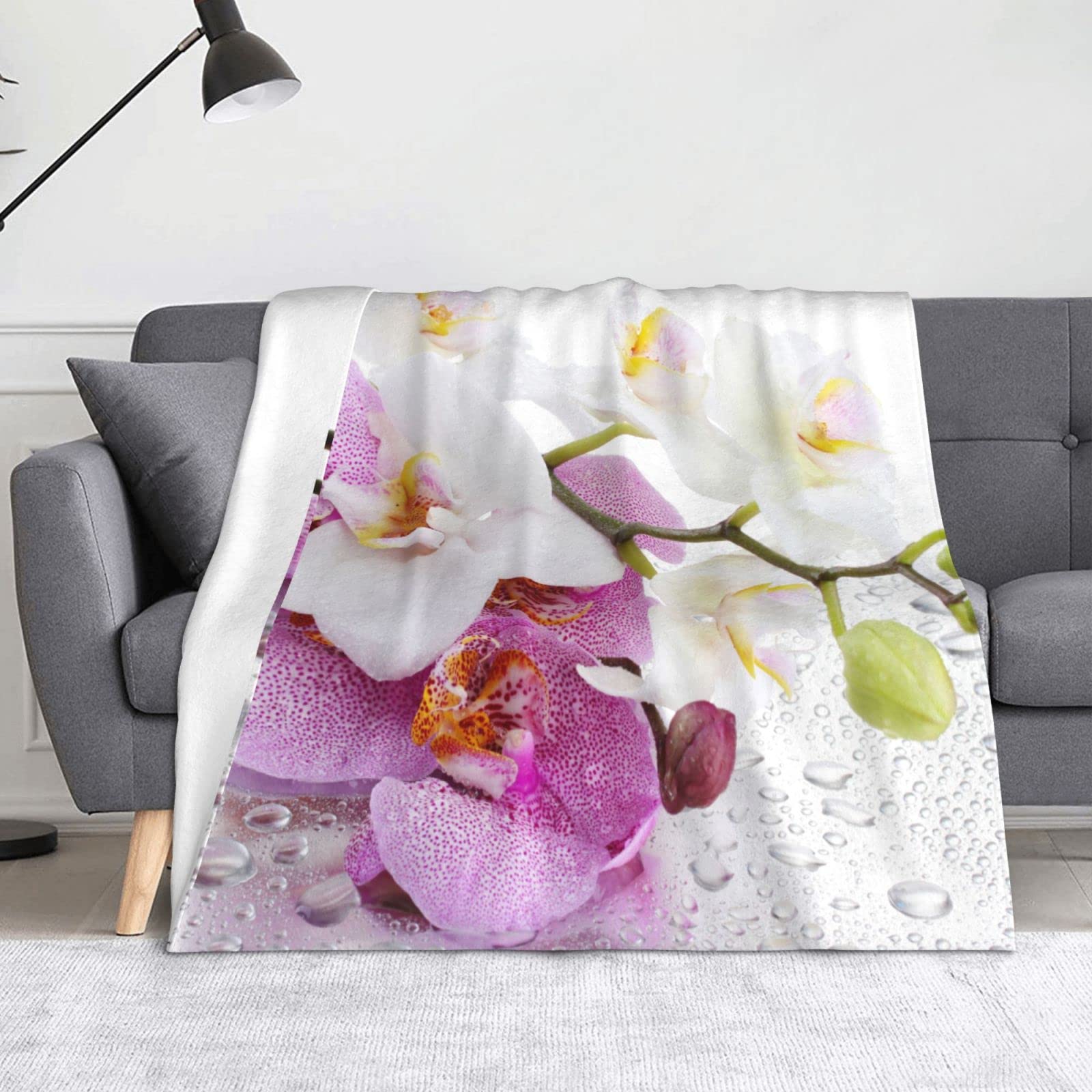 Couverture polaire douce thermorégulatrice à motif floral pour confort canapé durable