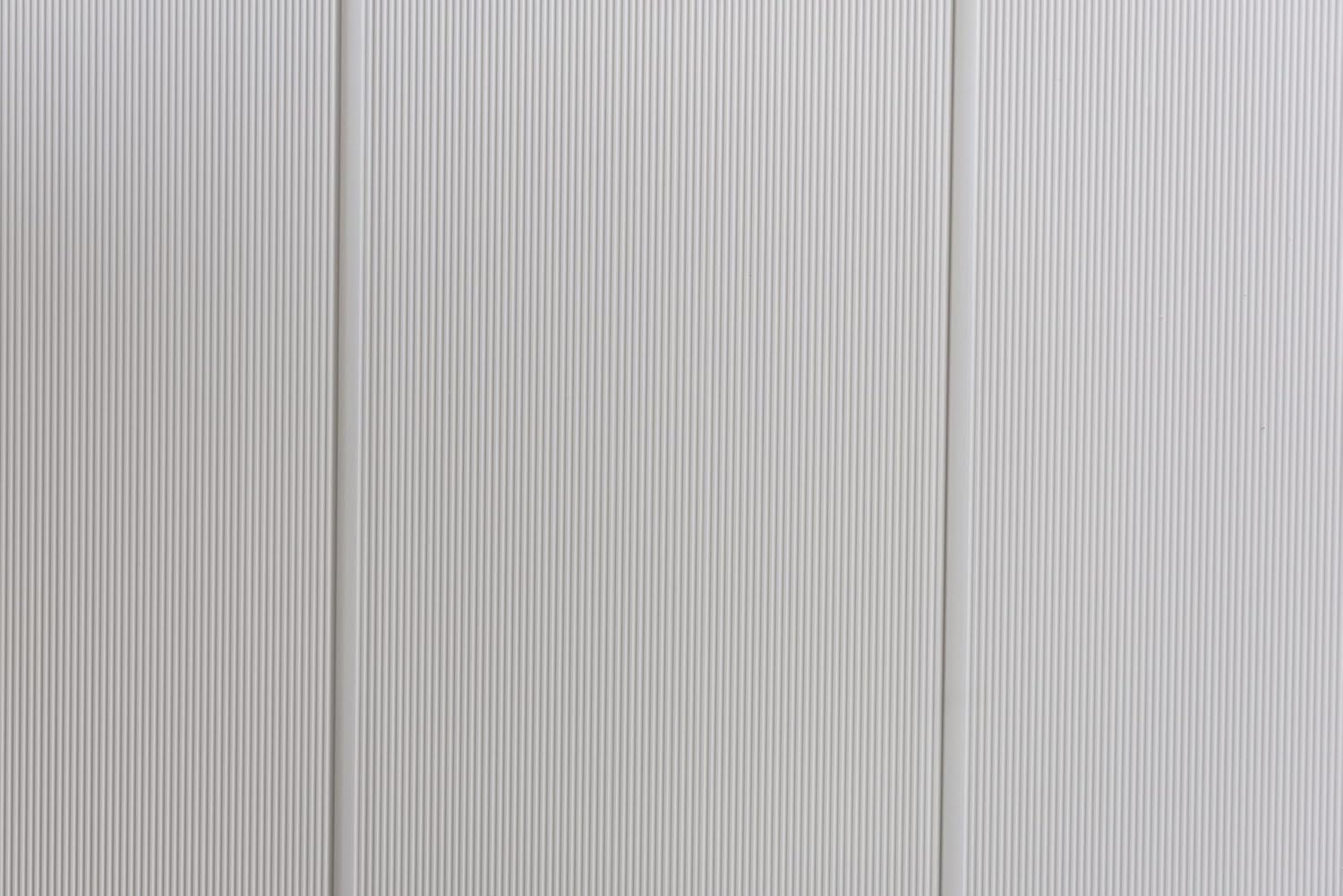 Keter Premier Jumbo Storage Shed with lid and doors open, storing garden tools and a grill.