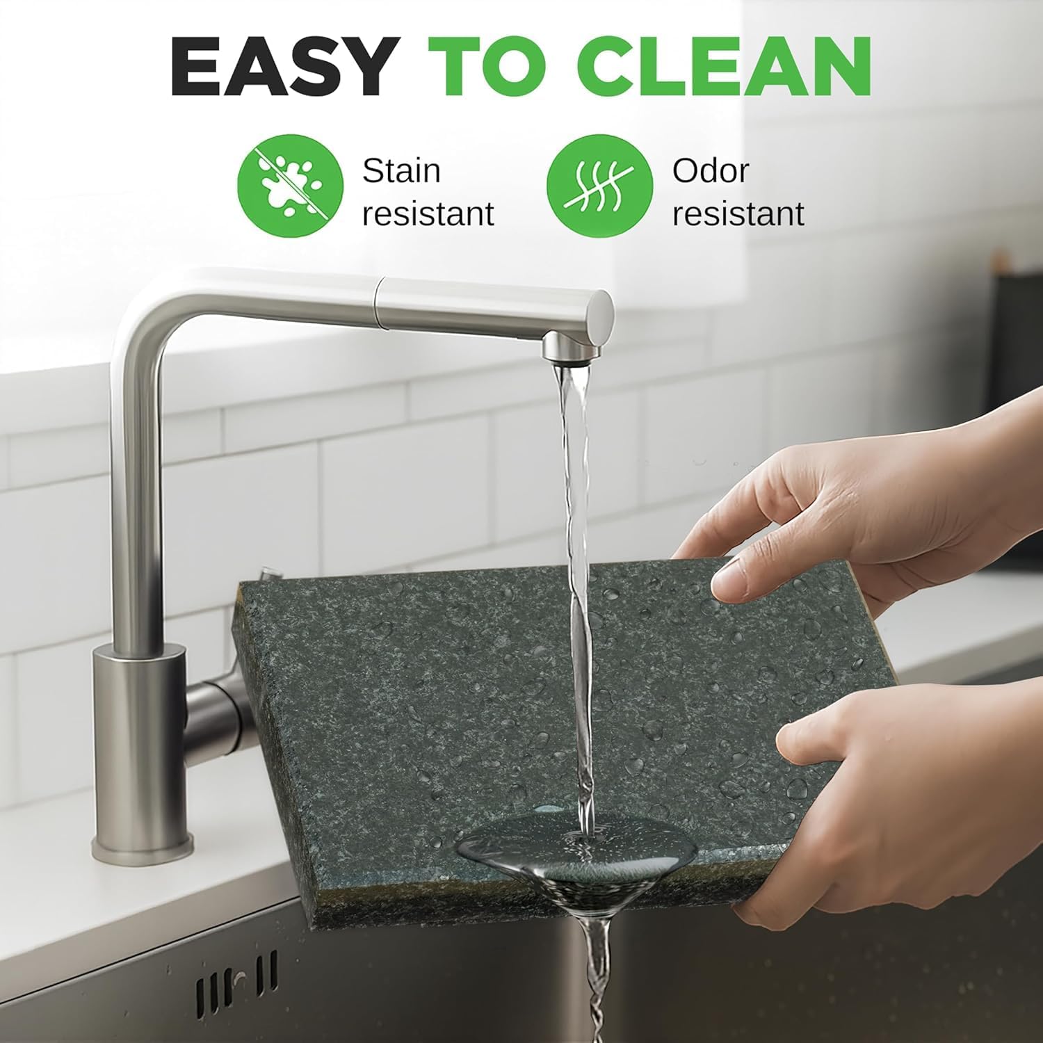 Hands rinsing the granite cooking stone under a faucet