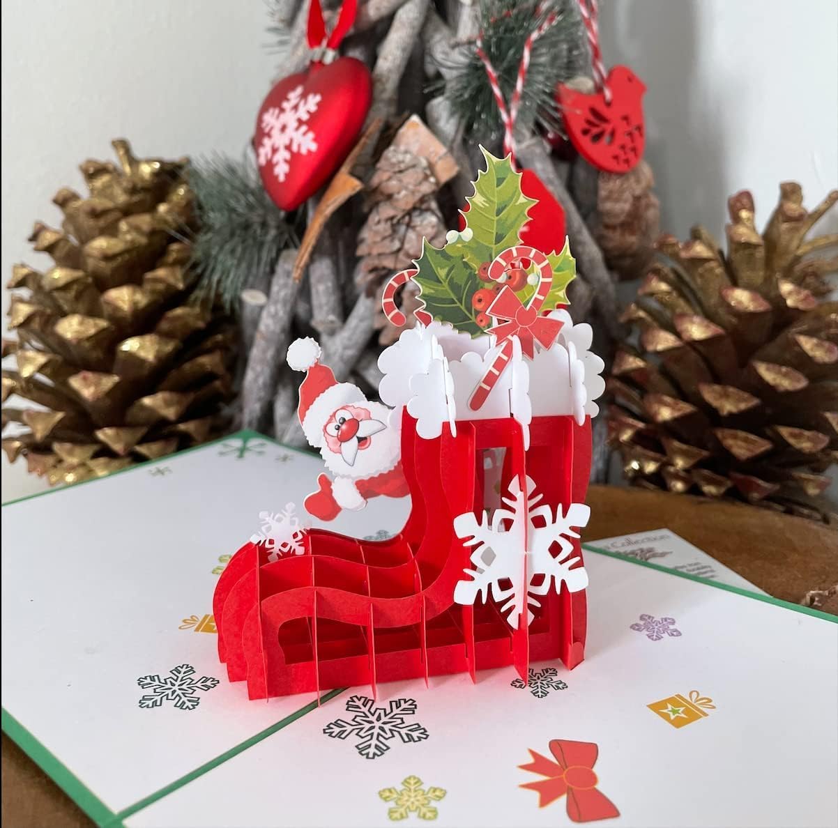 Santa Claus Red Gift Stocking 3D Pop Up card.A Delightful holiday surprise greeting card gift for kids, friends, family and loved ones. For Christmas decor and parties.15cmx15cm