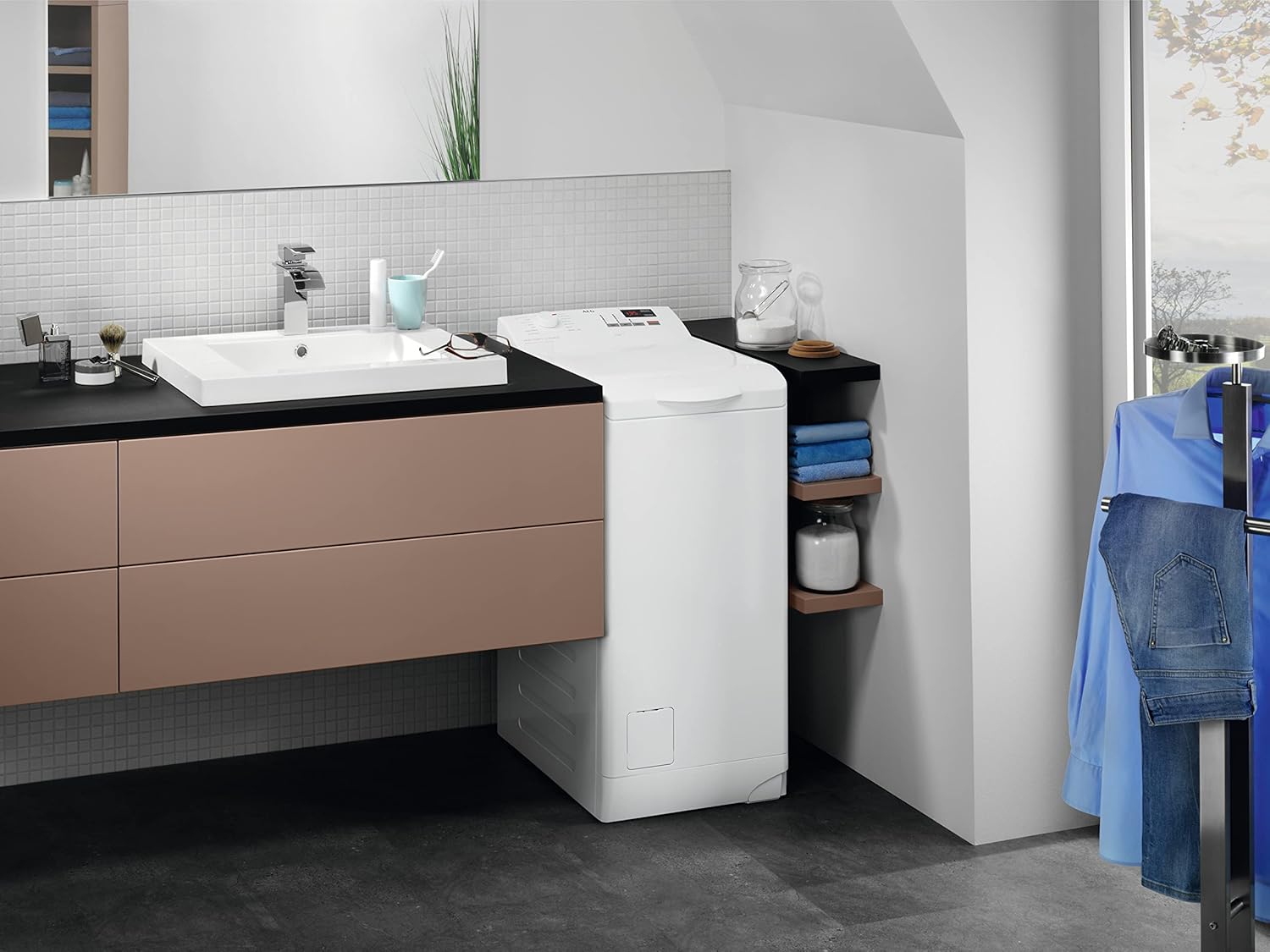 AEG washing machine installed in a modern bathroom
