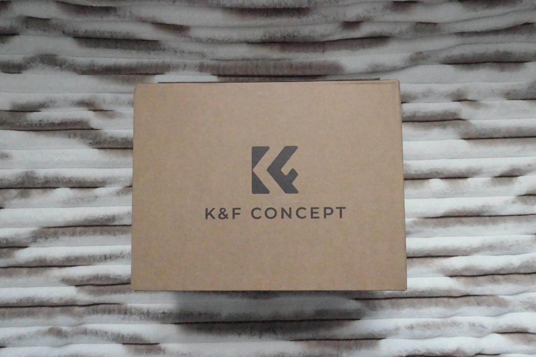 Decent mid-sized photographer's sling bag, good size to capacity ratio, quality materials