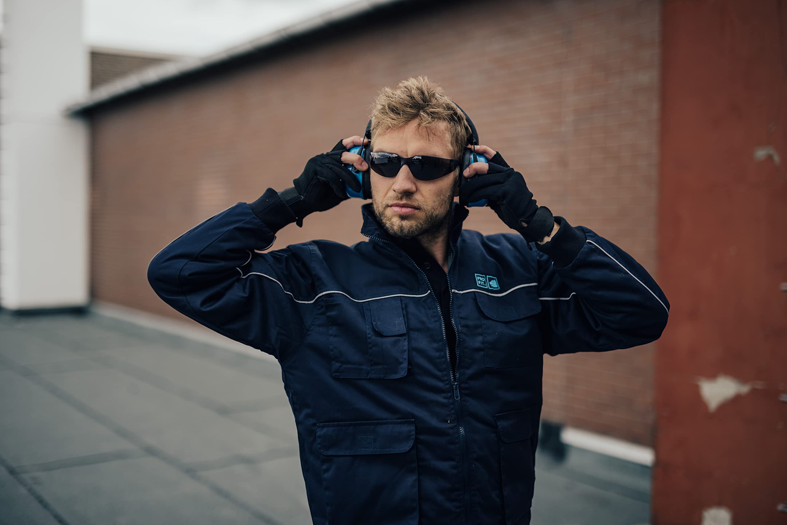 PRO FIT Profi Arbeitsjacke – Extra warme Jacke, Multitaschen & Hoher Kragen, Multifunktionale Arbeiterjacke mit Reflexstreifen, Unisex - Gr. S-XXL, Navy