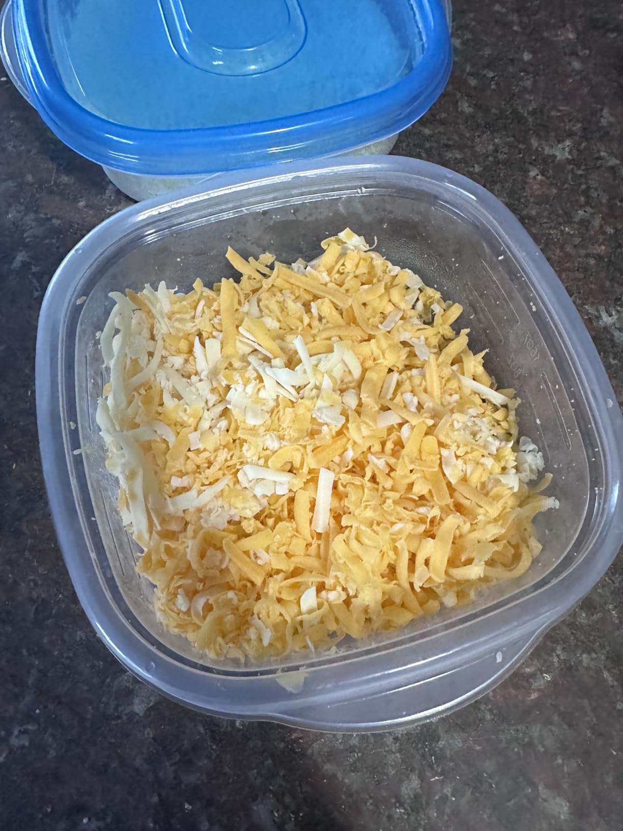 Freshly shredded cheese in minutes - so easy my 3 year old does it!